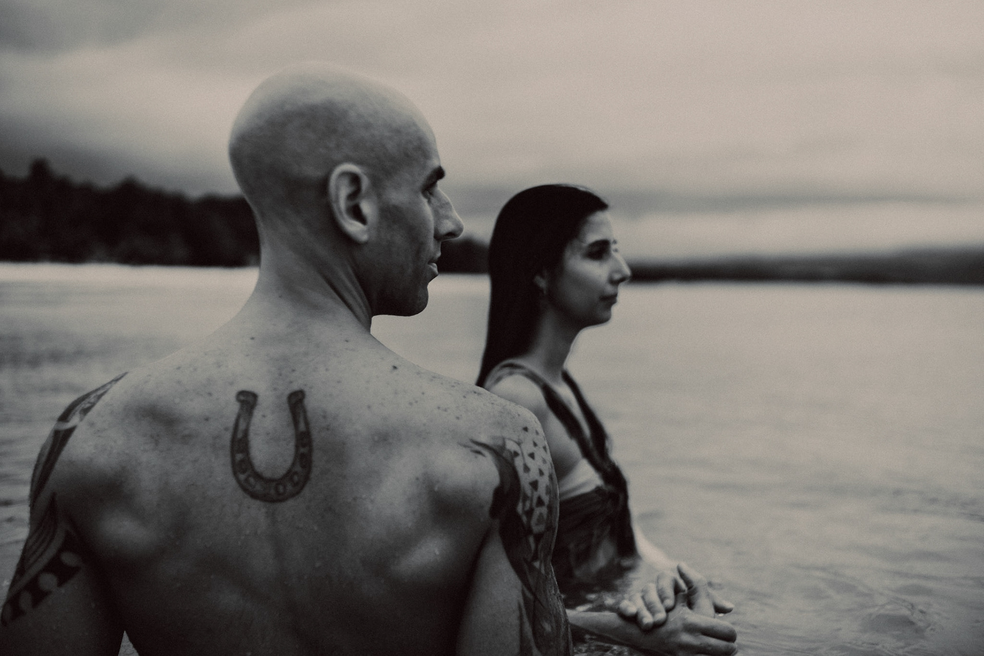 Moody destination couple portraits at White Beach Station 1, in black and white, shot in front of Discovery Shores, Boracay, Philippines, Southeast Asia, December 2018, Sony A7III.