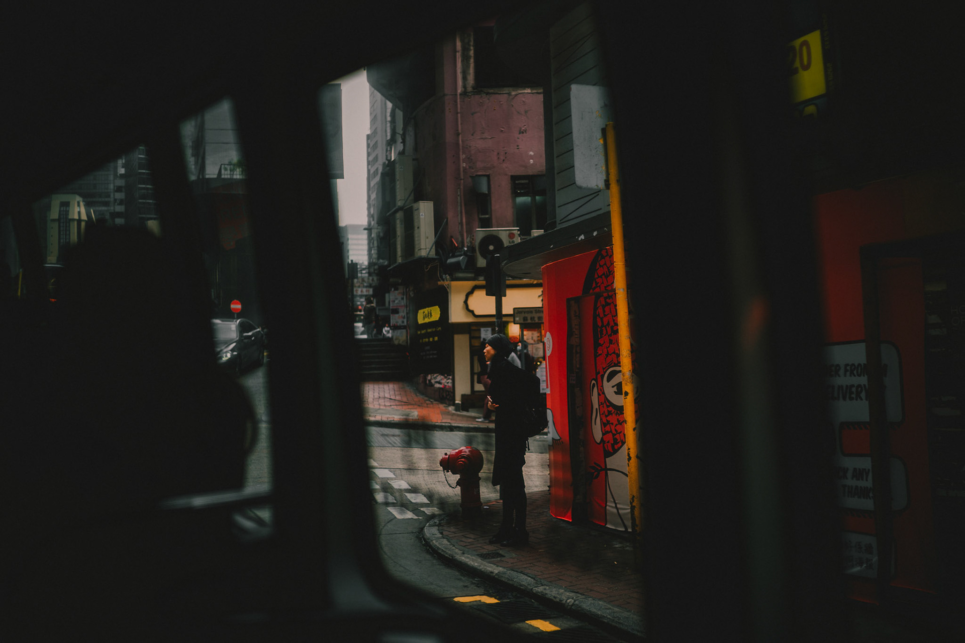 A pedestrian in Sheung Wan, Hong Kong, January 2016, Sony A7R II.