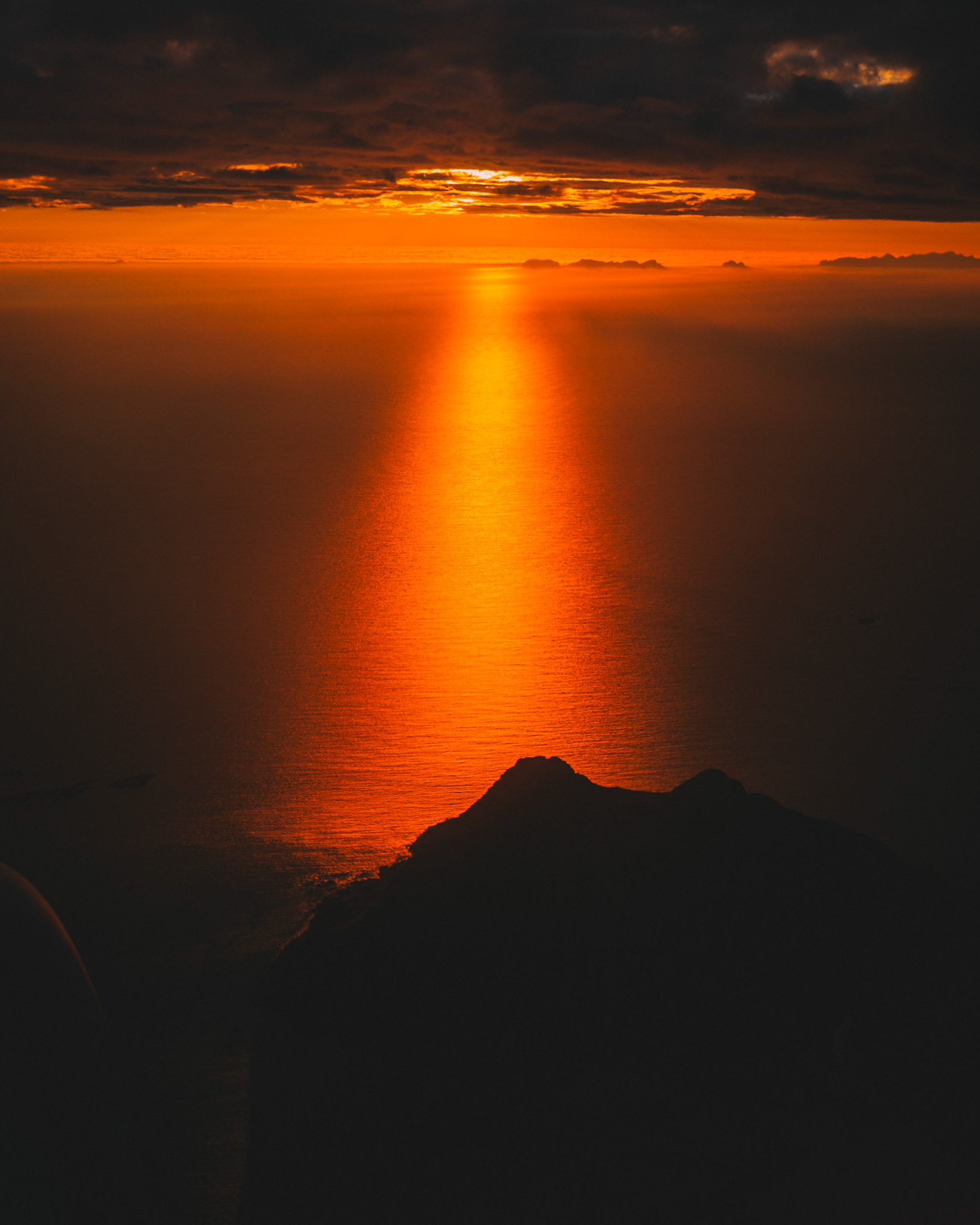 The midnight sun over Bodø through an airplane window, Nordland, Norway, July 2016, Leica M.