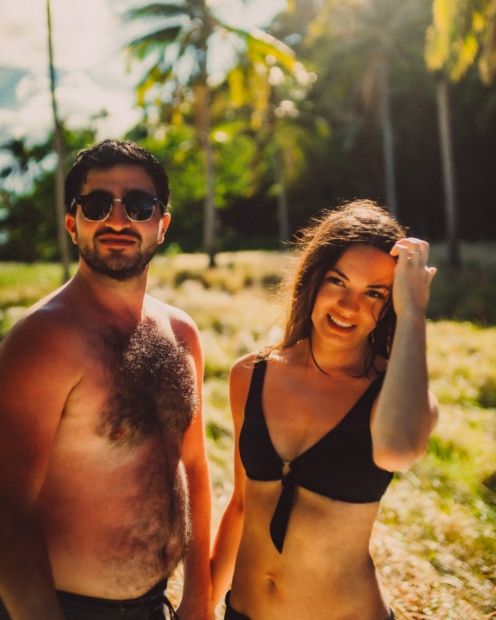 Chill couple portraits with palm trees in the background, Pinagbuyutan Island, El Nido, Palawan, Philippines, Southeast Asia, March 2020, Sony A7III.