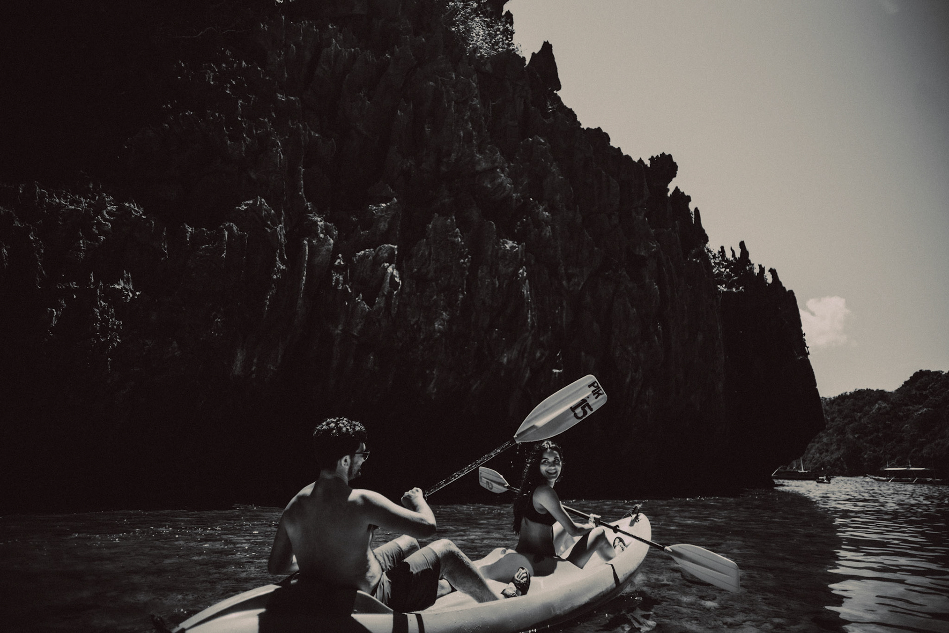 Kayaking back to the tour boat, in black and white, Hidden Beach, Matinloc Island, El Nido, Palawan, Philippines, Southeast Asia, March 2020, Sony A7III.