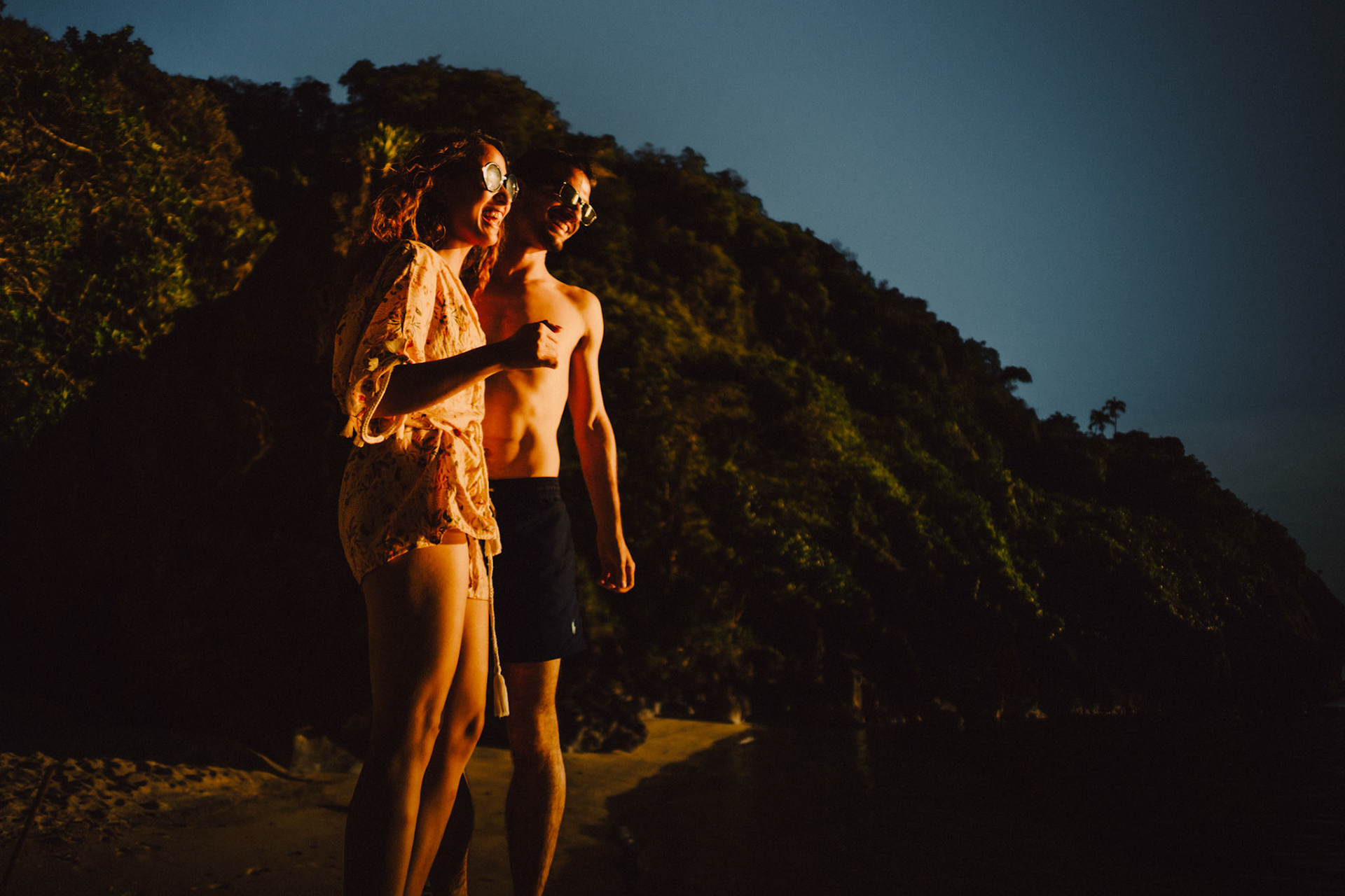 Couple portraits in Entalula Island's secluded west-facing beach just moments before sunset, El Nido, Palawan, Philippines, Southeast Asia, April 2019, Sony A7III.