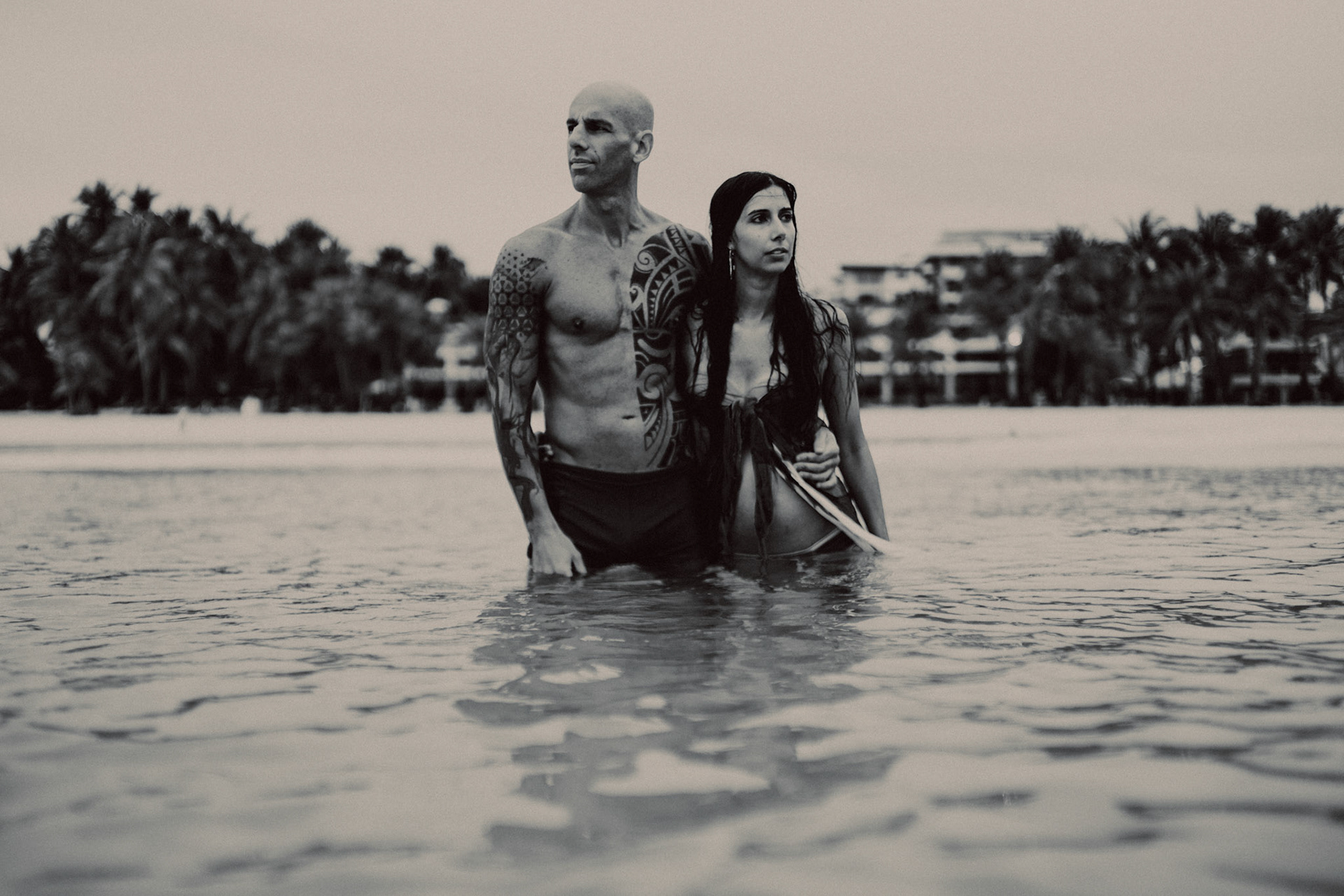 Intimate destination couple portraits at White Beach Station 1, in black and white, shot in front of Discovery Shores, Boracay, Philippines, Southeast Asia, December 2018, Sony A7III.