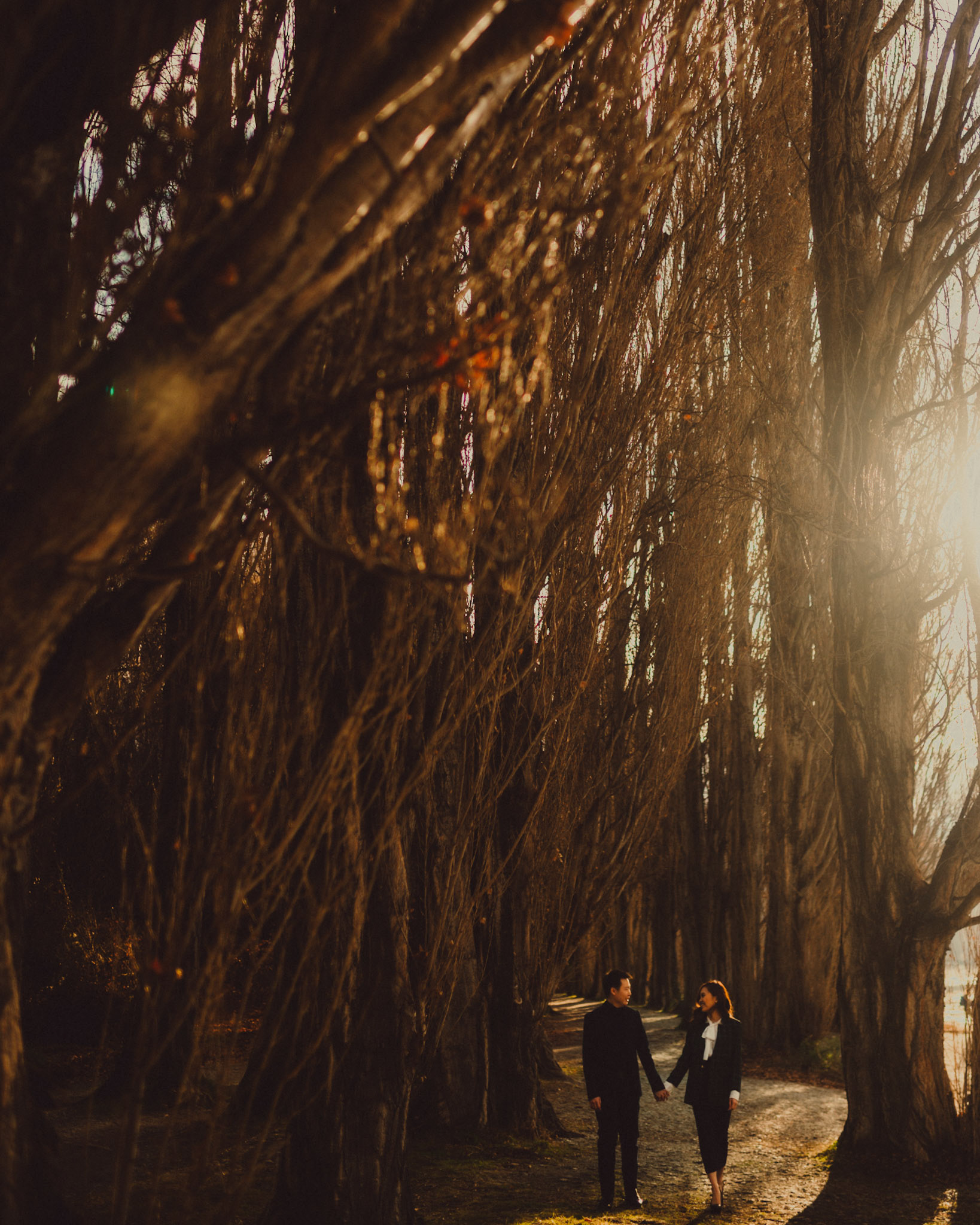 Couple portraits in a vine-filled forest, Lake Wanaka, Otago, New Zealand, June 2017, Leica M.