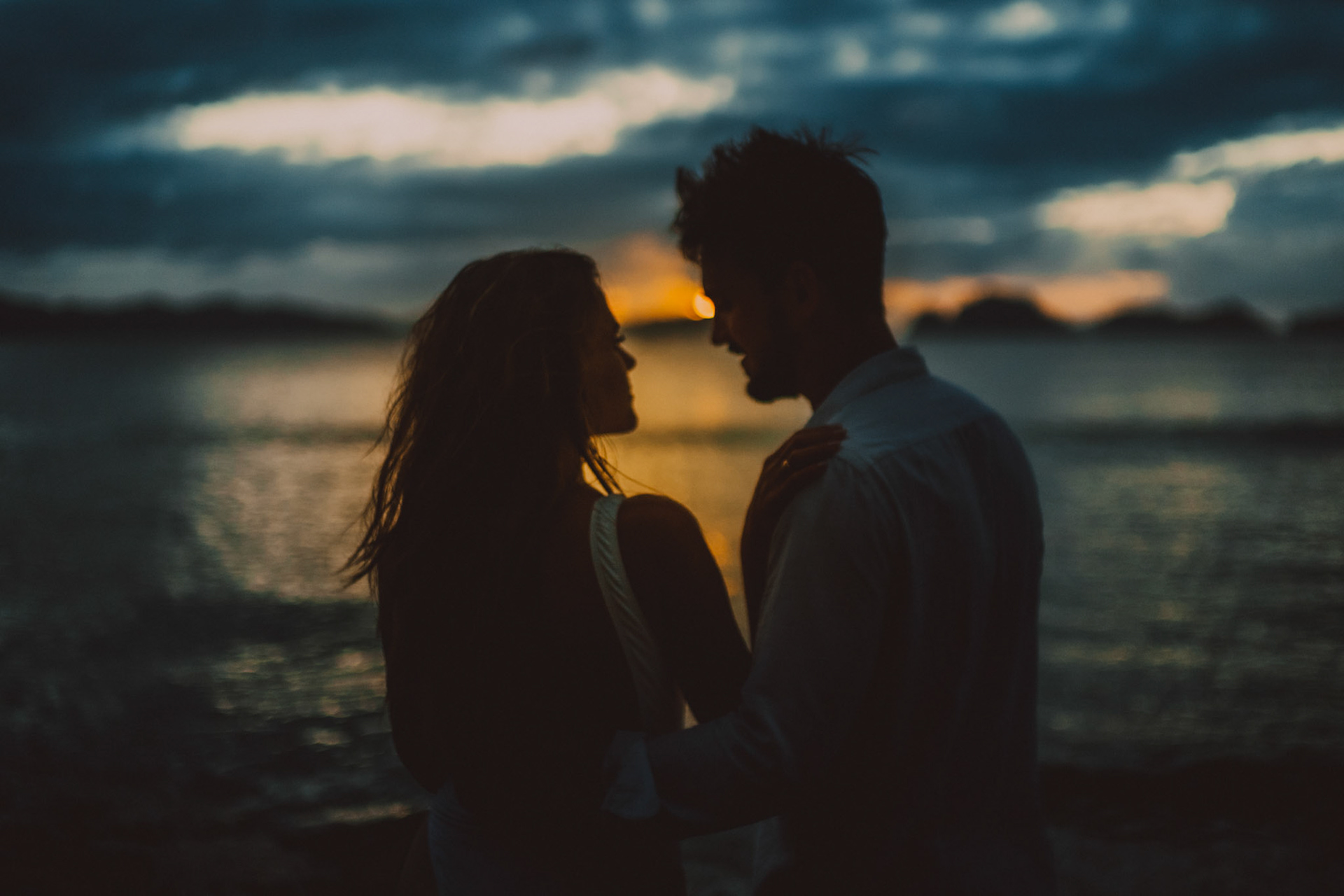 Moody and intimate couple sunset portaits in Las Cabanas Beach, El Nido, Palawan, Philippines, Southeast Asia, December 2019, Sony A7III.