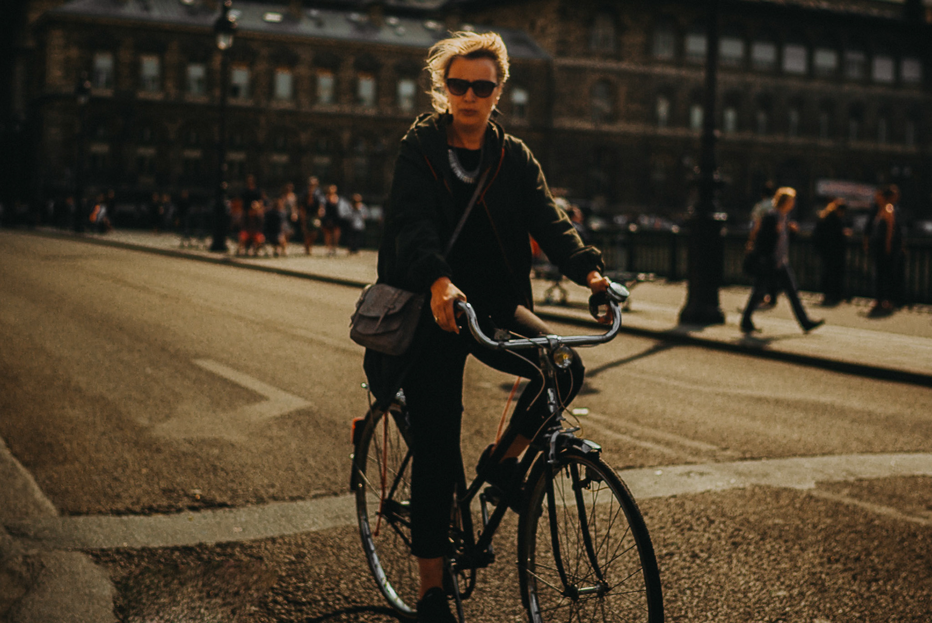 A woman on a city bike at Pont d'Arcole, Paris, France, July 2015, Leica M.