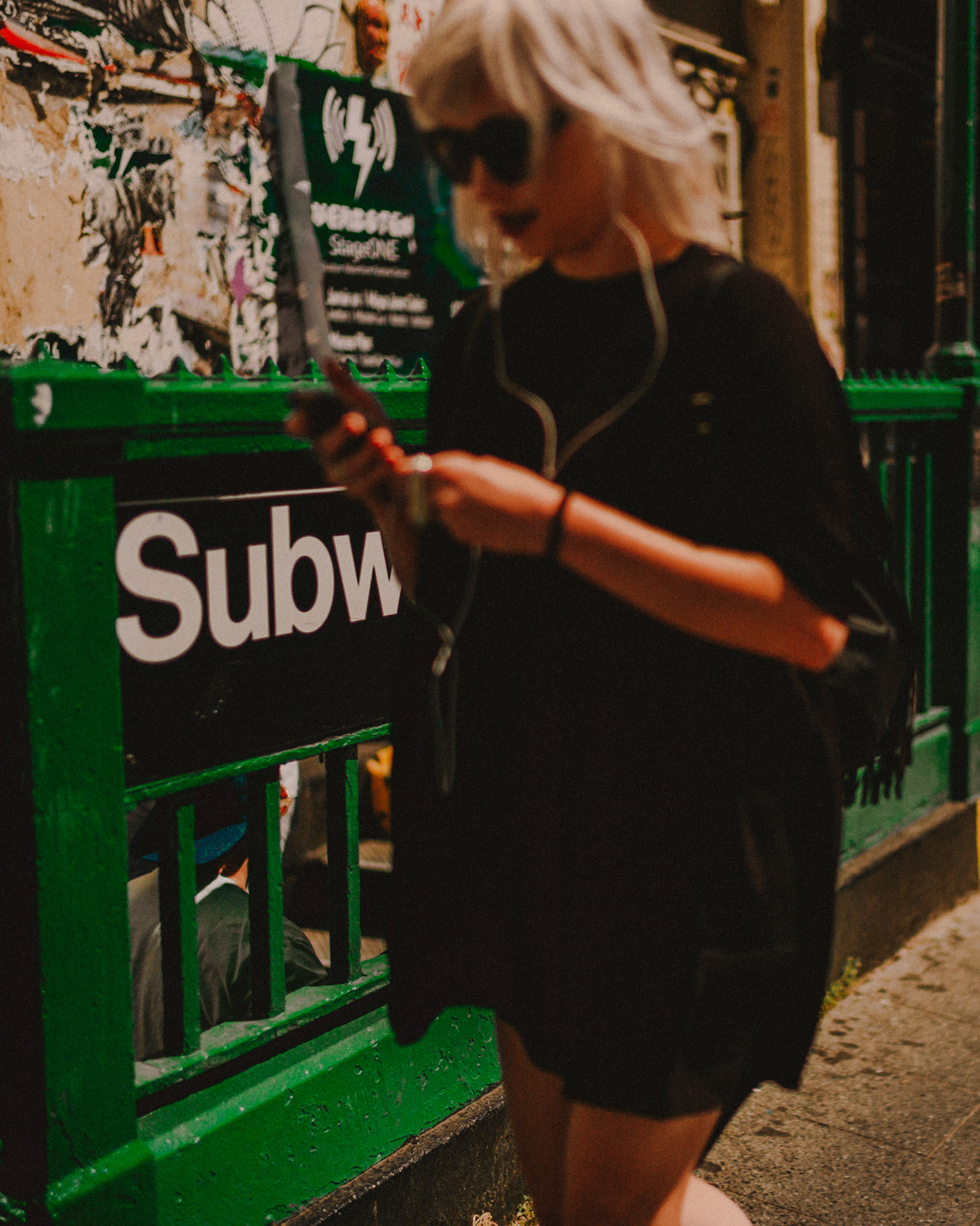 A woman wearing sunglasses, Bedford Avenue Subway Station in Brooklyn, New York City, USA, September 2015, Leica M.