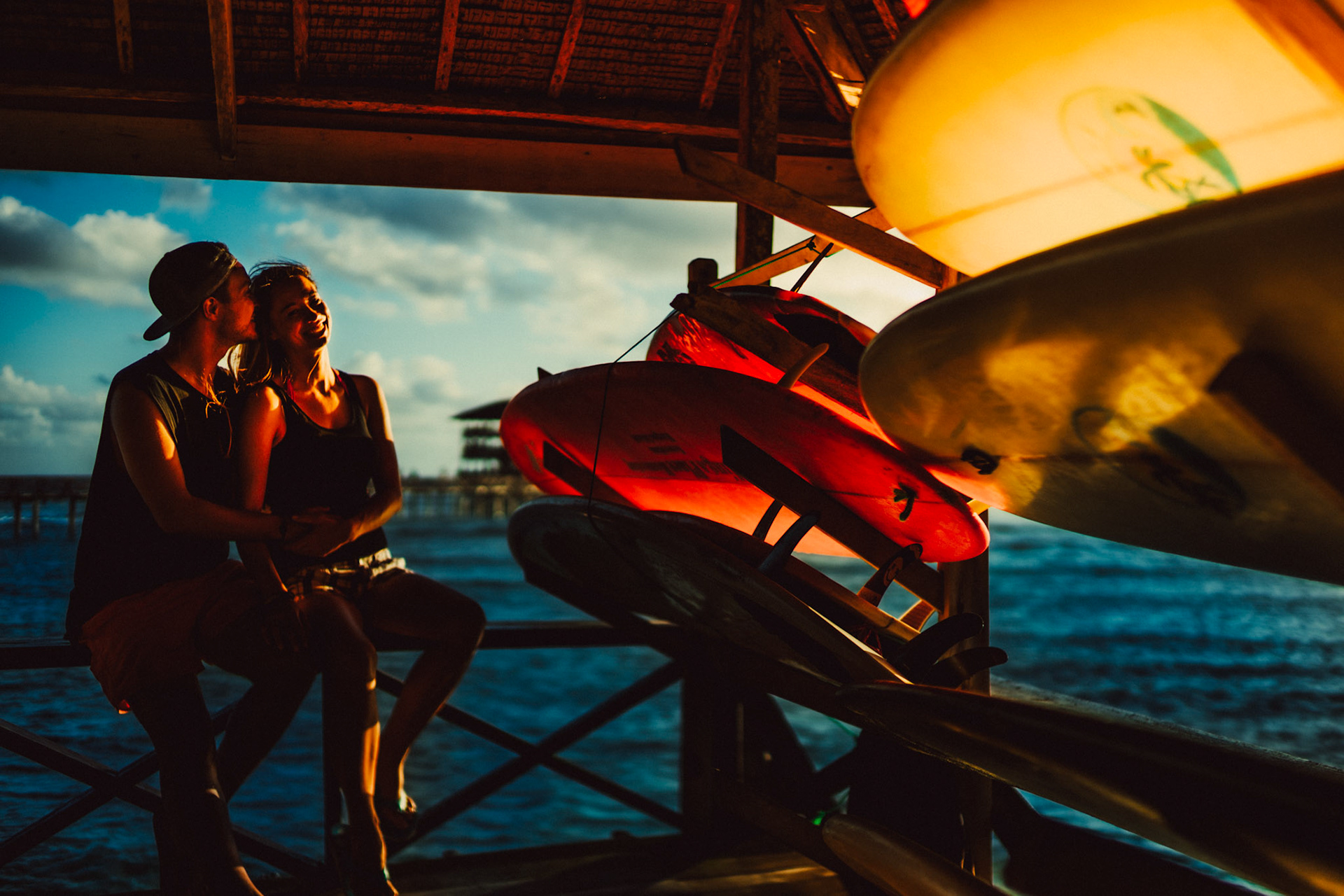 Candid and chill morning couple portraits, in boardshorts, tanktops, surfboards and all, Cloud 9, Siargao Island, Philippines, Southeast Asia, March 2019, Sony A7III.