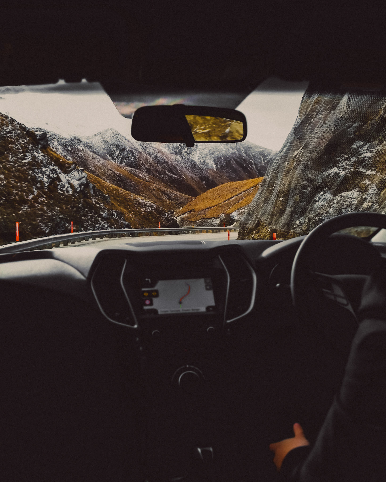 A mountain pass from inside a vehicle en route to Queenstown, New Zealand, June 2017, Huawei P10 Plus.