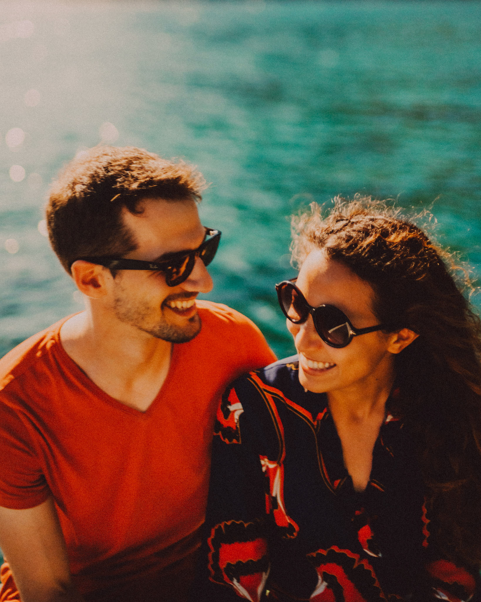 Couple portraits on a speedboat with turquoise blue water in the background, Cadlao Island, El Nido, Palawan, Philippines, Southeast Asia, April 2019, Sony A7III.