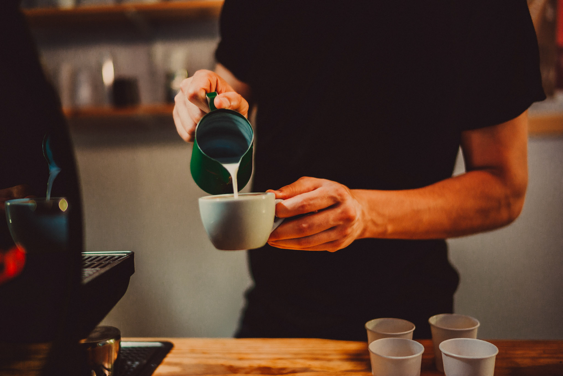 Pouring milk over espresso, Nomad Coffee, Barcelona, Spain, July 2016, Leica M.