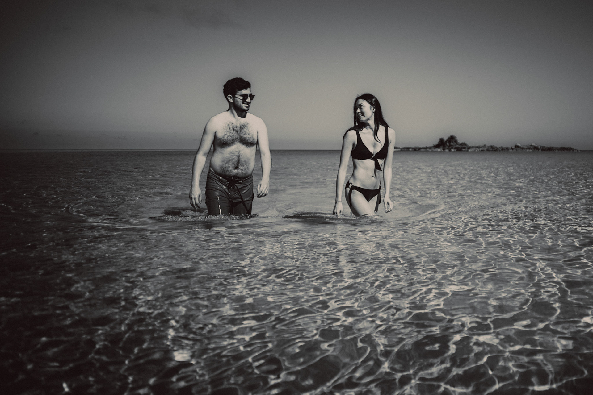 Wading through clear, waist-deep water on a tropical beach in Cadlao Island, El Nido, Palawan, Philippines, Southeast Asia, March 2020, Sony A7III.