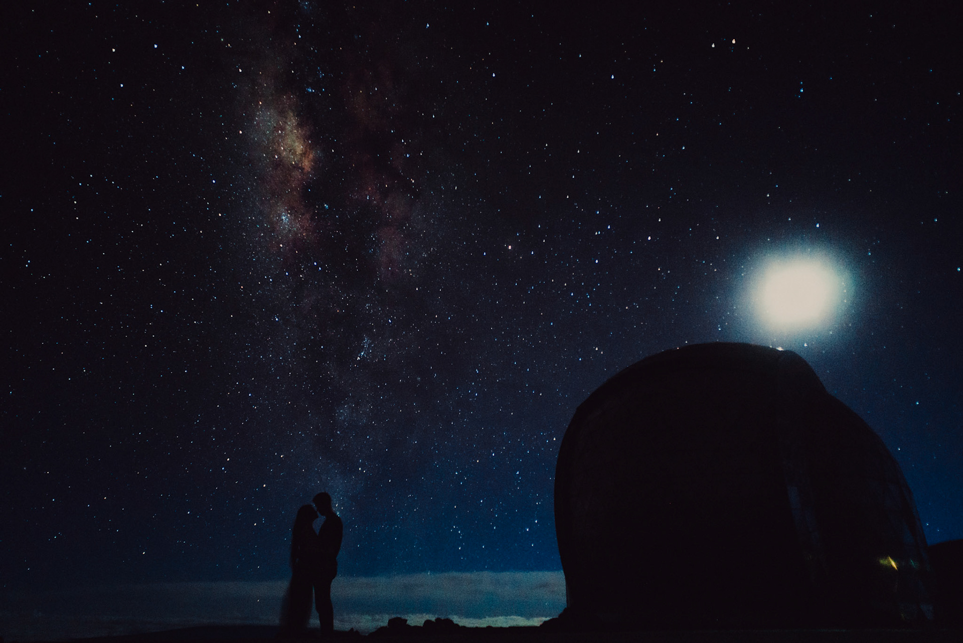 Night sky and Milky Way couple silhouettes, from Ryan and Angela's adventure pre wedding photoshoot in Hawaii, USA, September 2015, Sony A7S.
