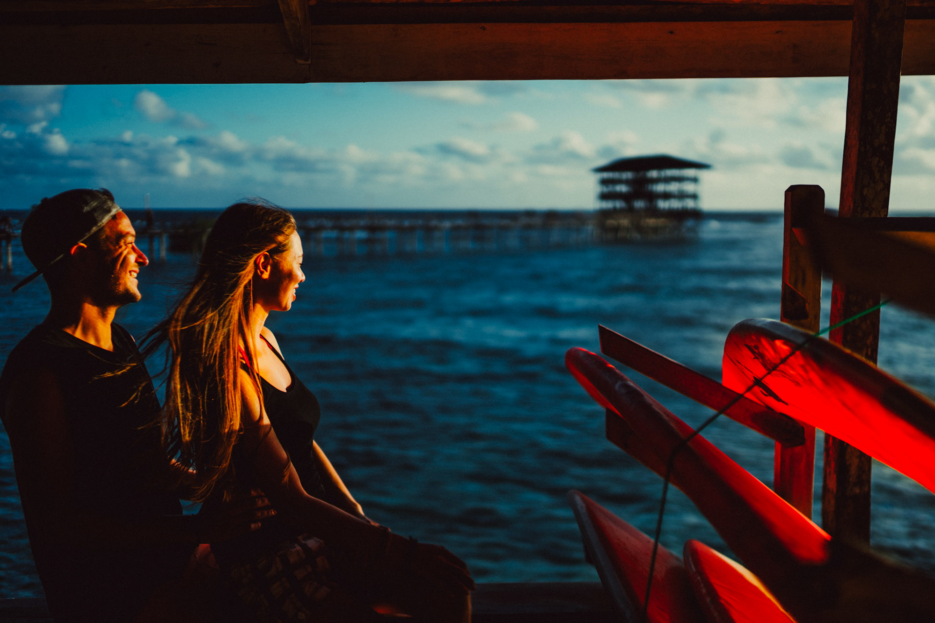 Candid and chill morning couple portraits, in boardshorts, tanktops, surfboards and all, Cloud 9, Siargao Island, Philippines, Southeast Asia, March 2019, Sony A7III.