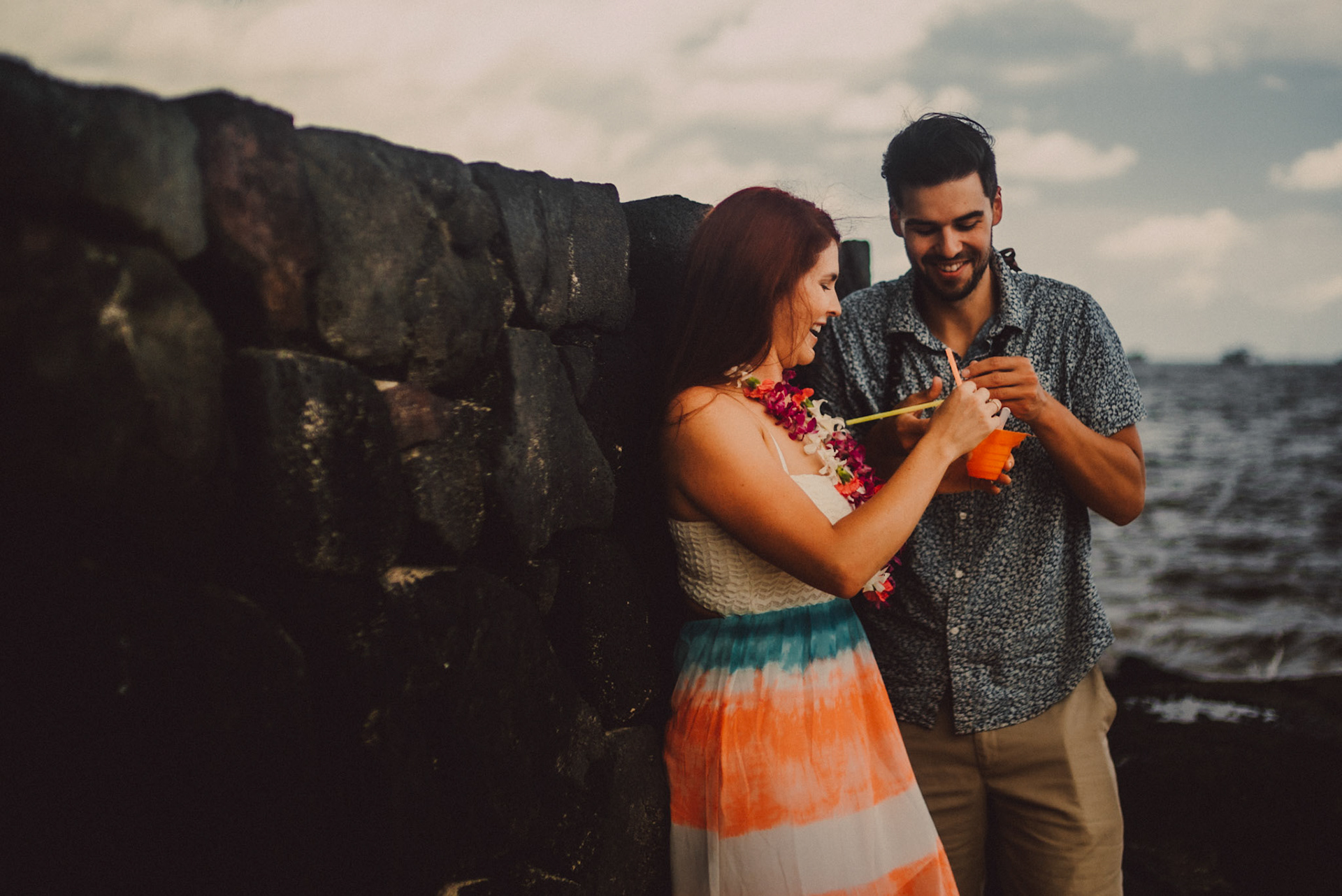Sharing a snow cone in one of Kona's beaches. From Ryan and Angela's adventure pre wedding photoshoot in Hawaii. September 2015.
