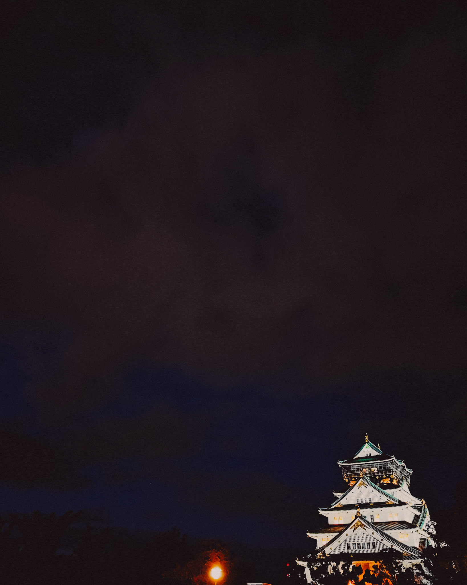 Osaka Castle at night with copy space, Osaka, Japan, December 2019, Huawei Mate 30 Pro.