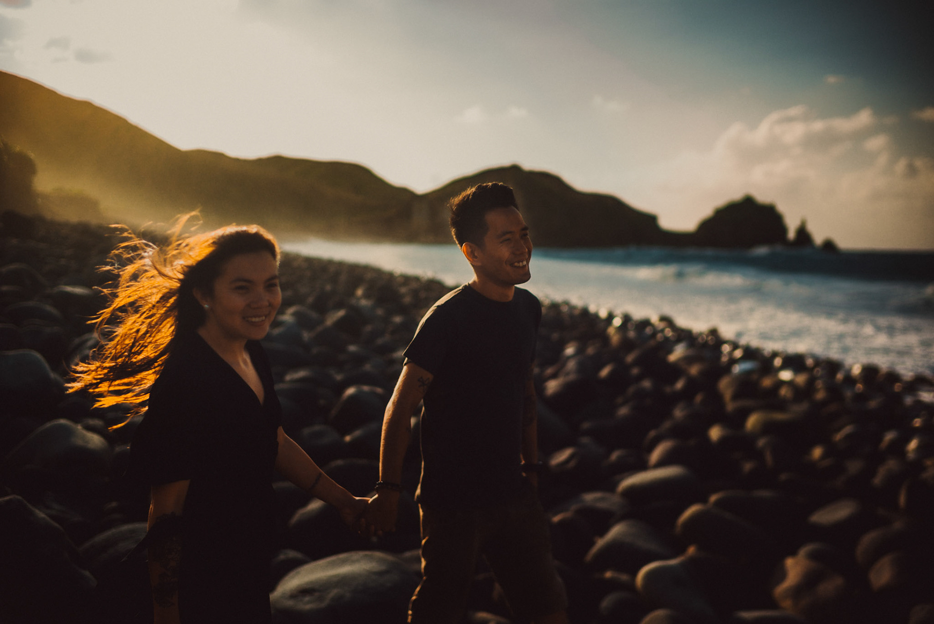 Candid and chill couple portraits from Owen and Nikka's adventure prenup photoshoot in Chadpidan Boulder Beach, Batanes, Philippines, October 2017, Leica M.