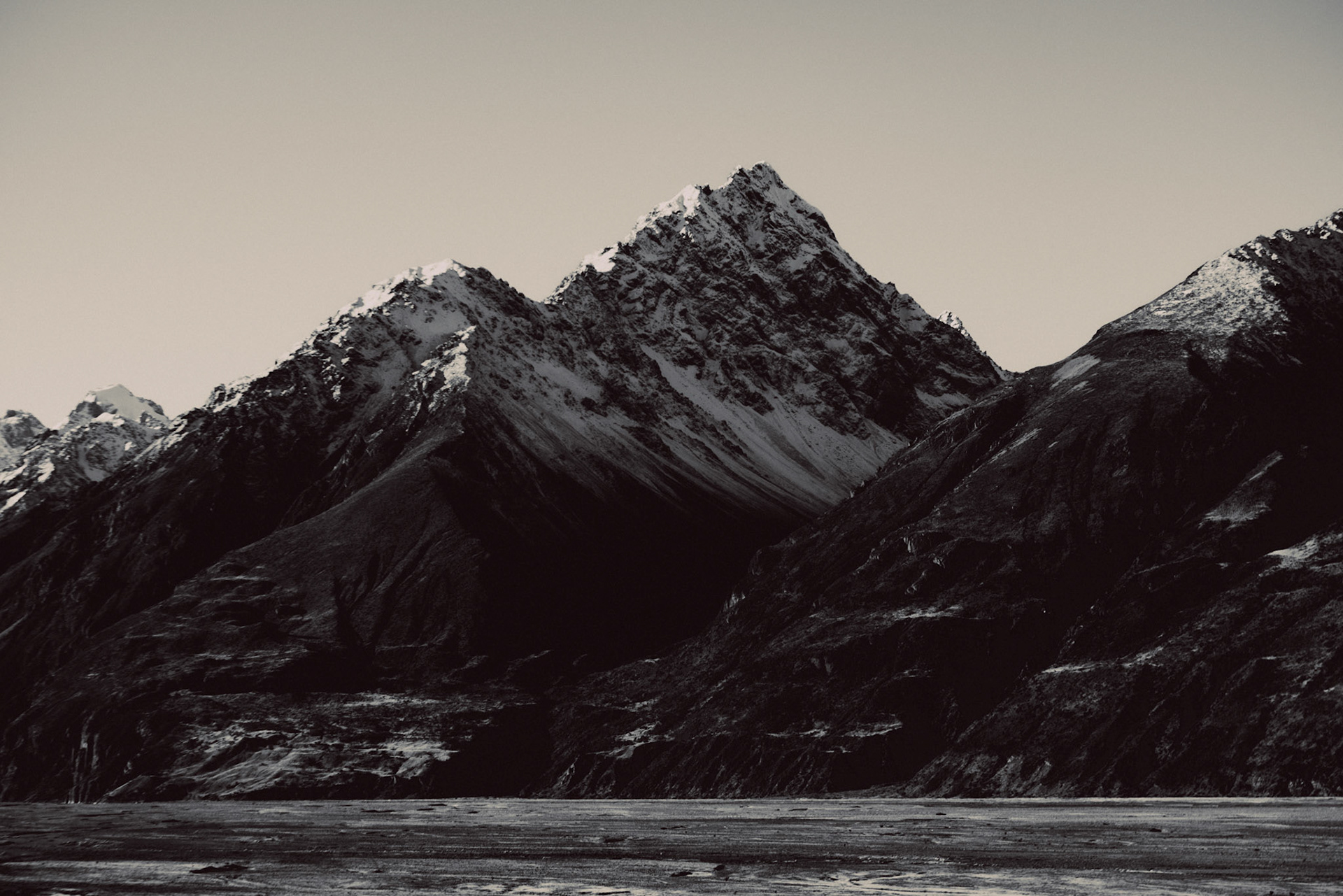 Snow-capped mountain tops in Aoraki/Mount Cook National Park, in black and white, Canterbury, New Zealand, June 2017, Sony A7RII.