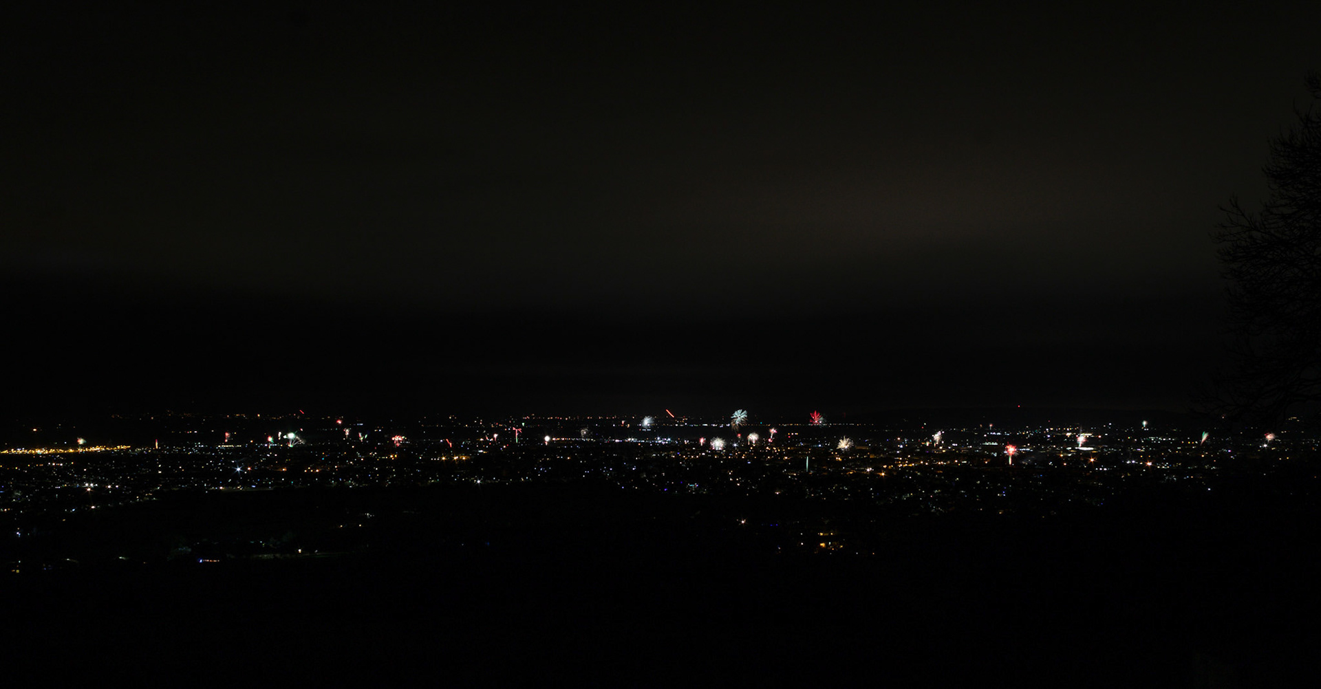 Wide angle capture of the midnight fireworks over Cheltenham
