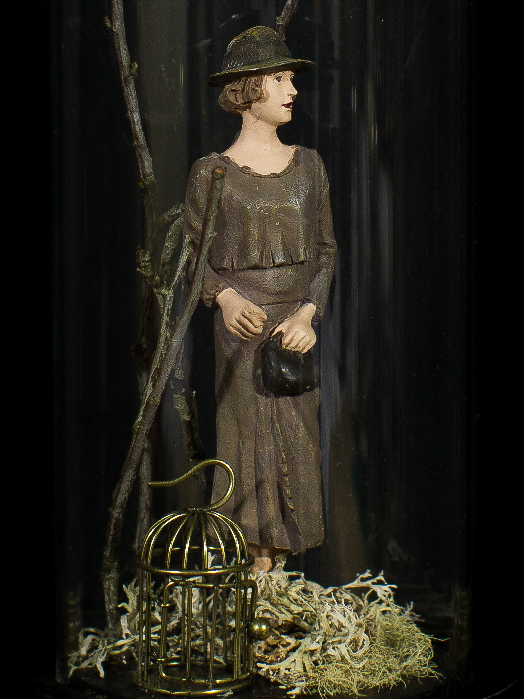 A Good Catch - Antique wooden stand, vintage miniature doll, brass and other metals, glass and wood bell jar. 50 x 26 x 14