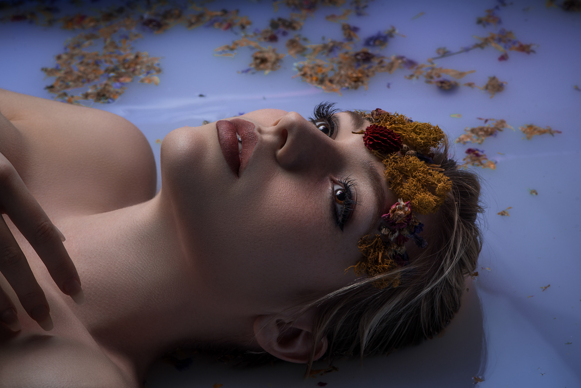 people photography, model between flowers and colored water