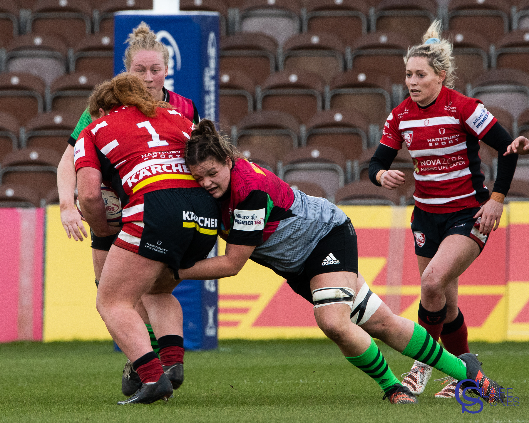 Cara Hope tackled by Sarah Beckett