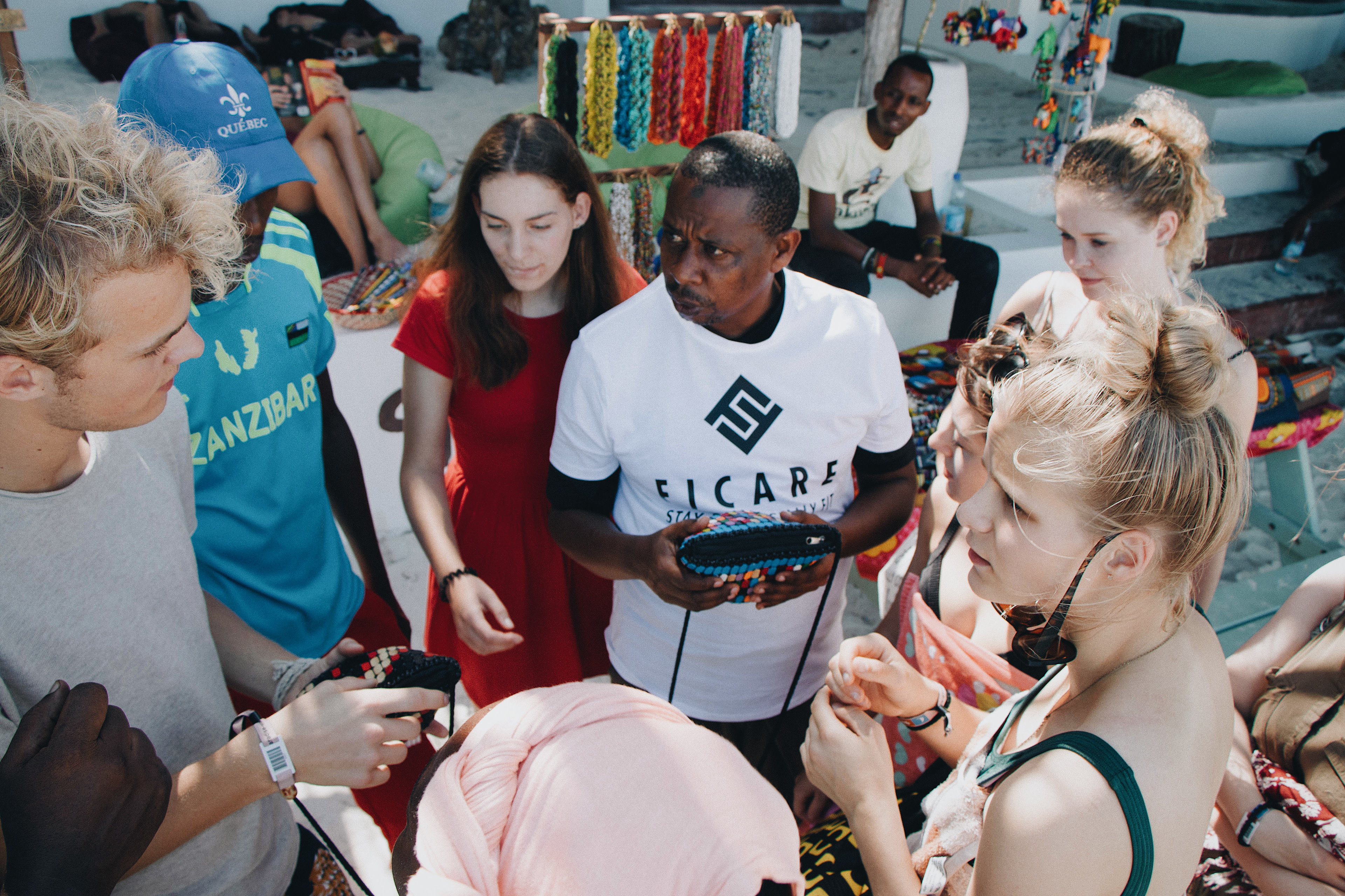 Discussing about adjustments in design to make it more appealing for their target group.