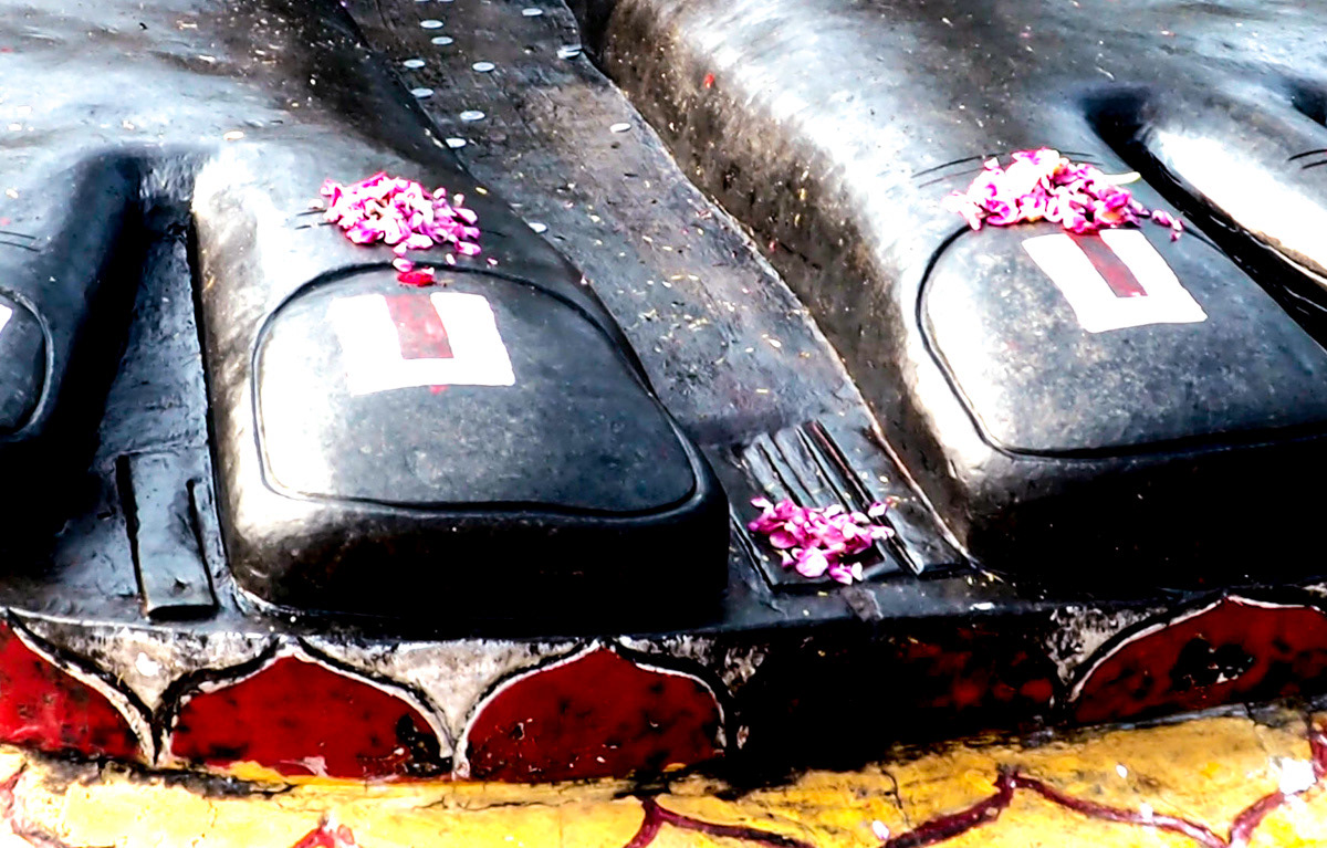 Pilgrims feet along pilgrimage route