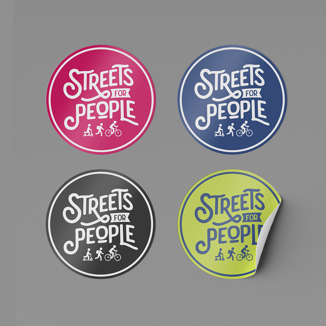 Four logo stickers in bright colours by Onyx Design