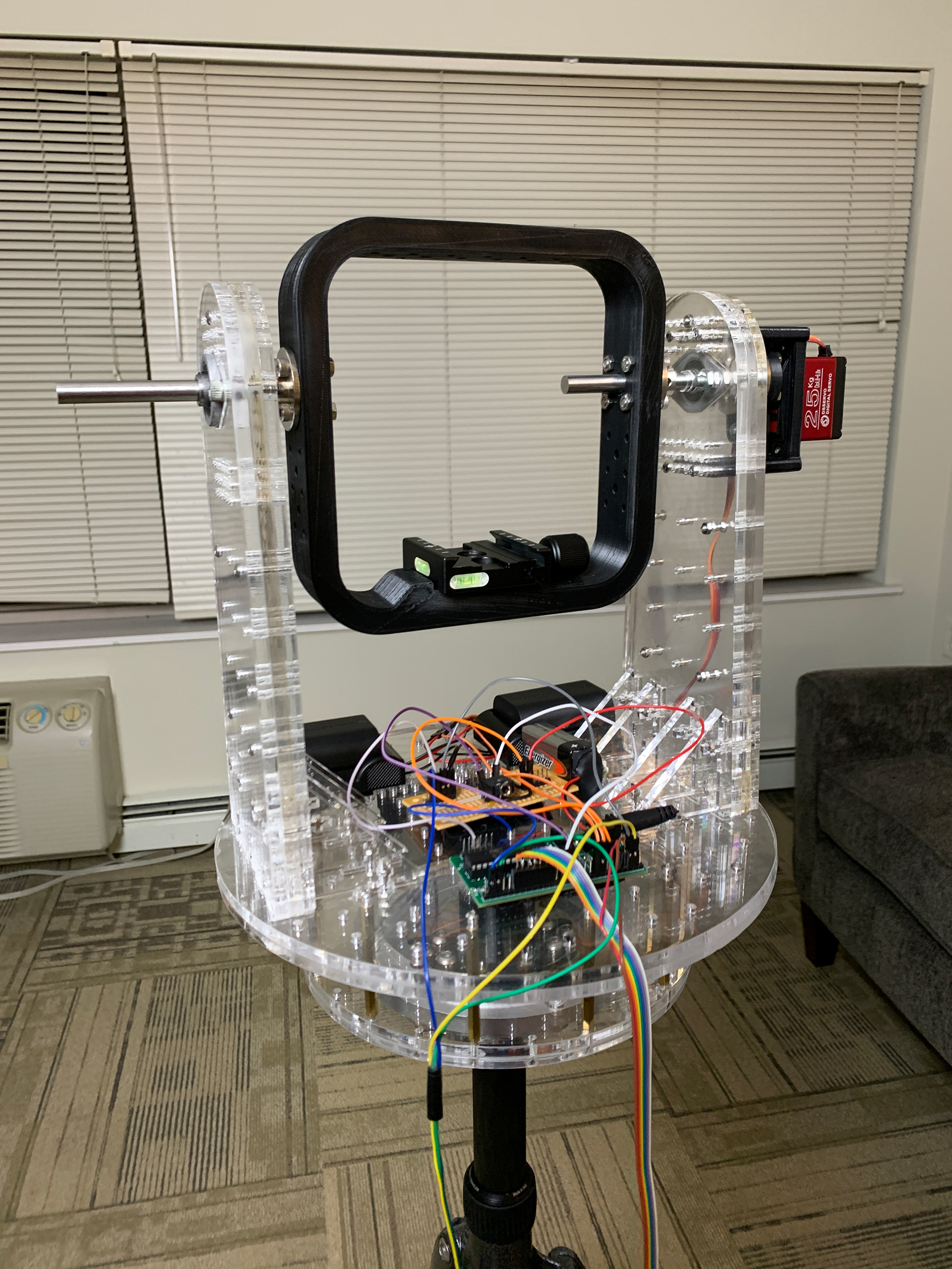 Front view of the finished platform assembly without the camera. All the circuit boards and batteries are mounted on the horizontal plate to minimize interference with the camera during rotation.