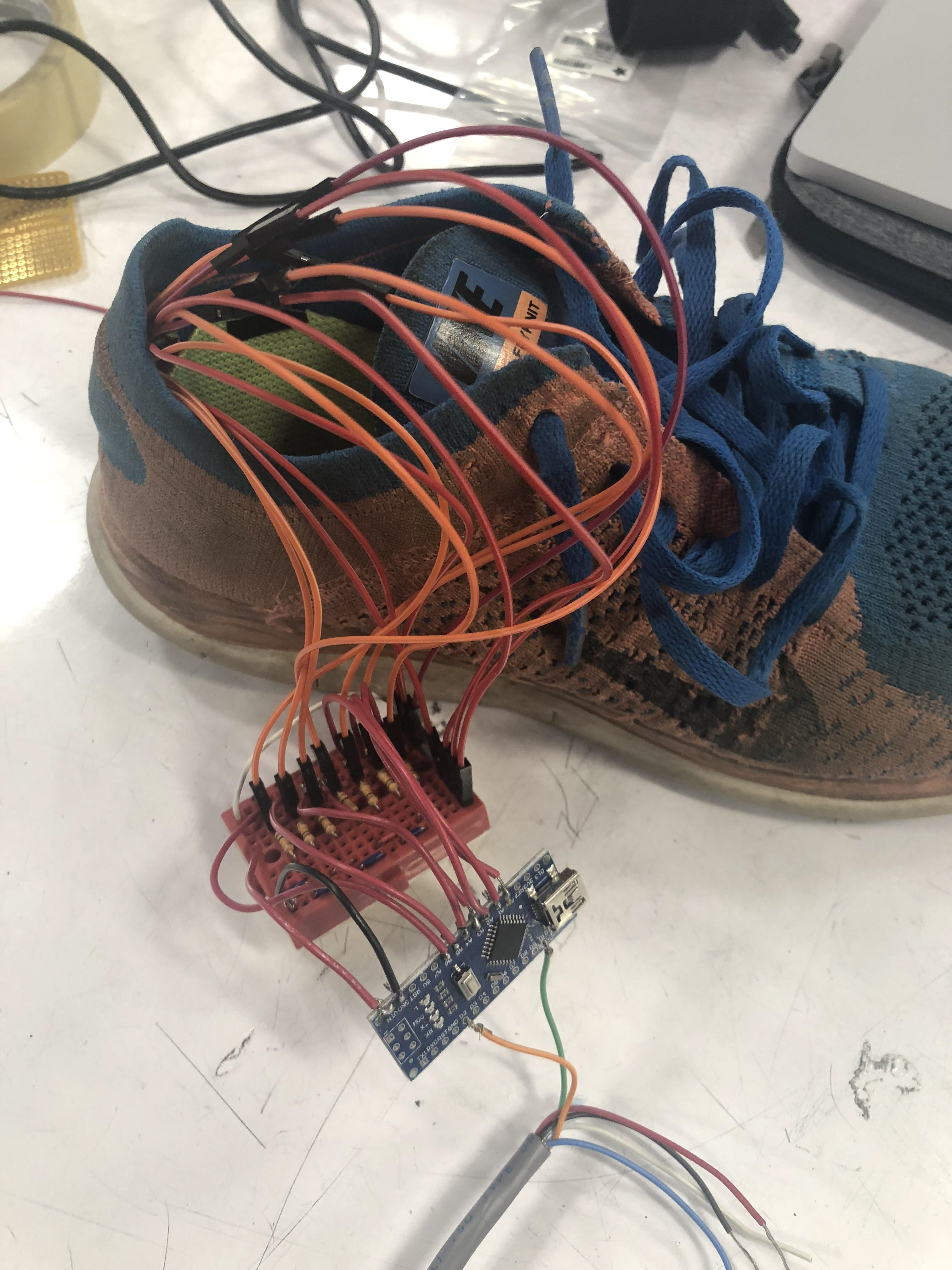Connecting each sensor to its corresponding input pin.