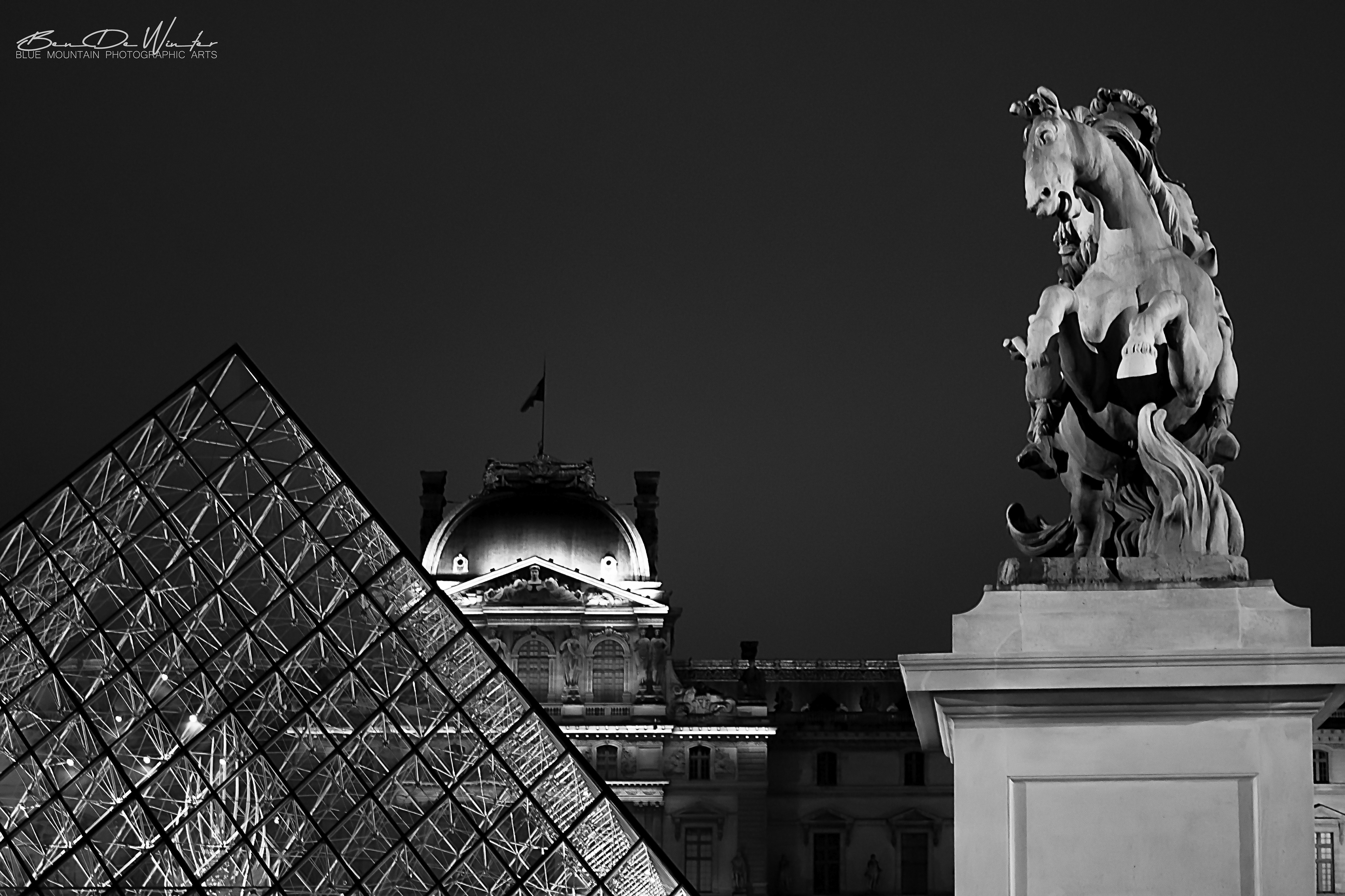 Louvre by night