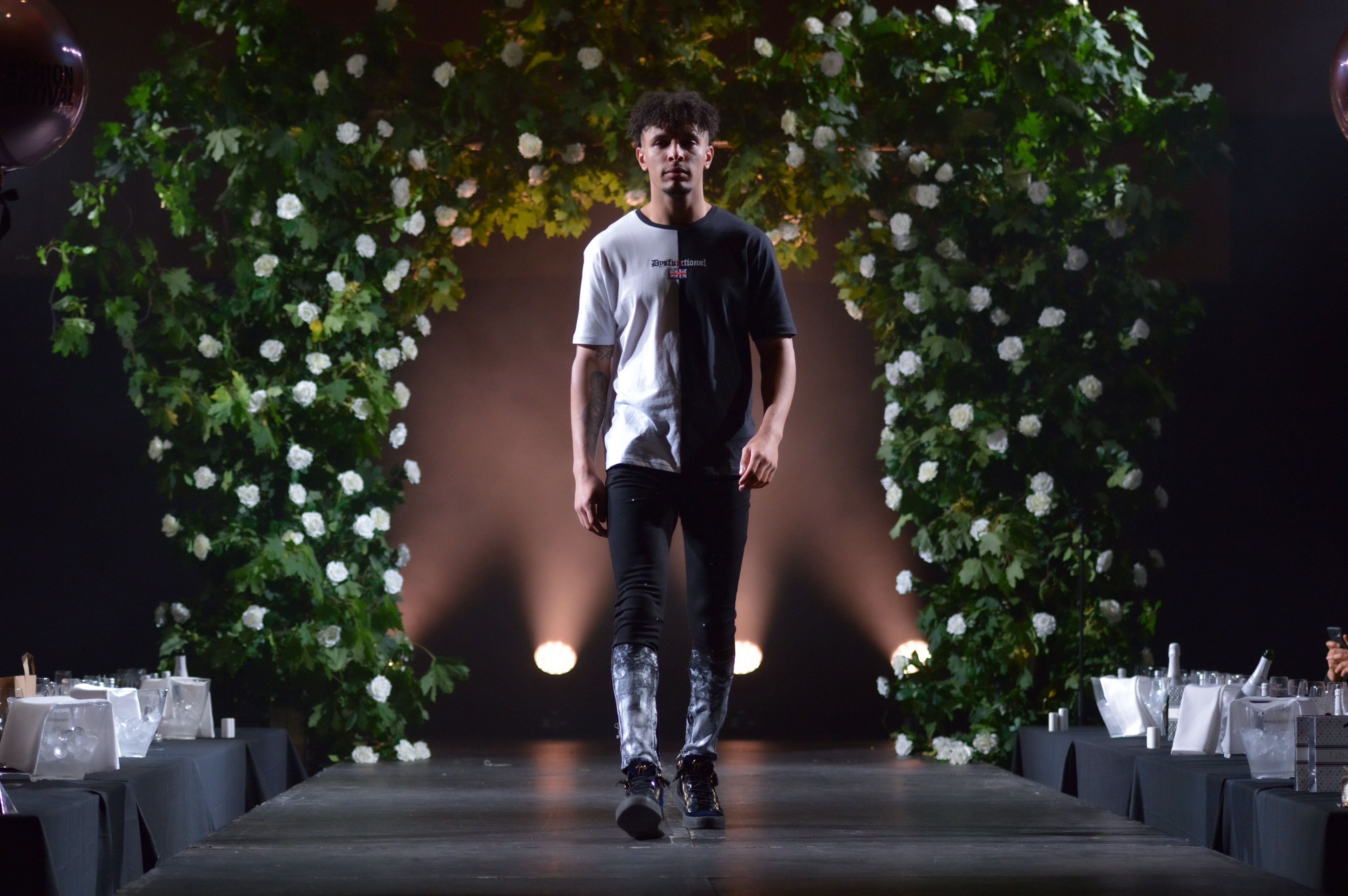 lindsey ahmet graphic designer and photographer model on runway for dysfunctional UK fashion photographer