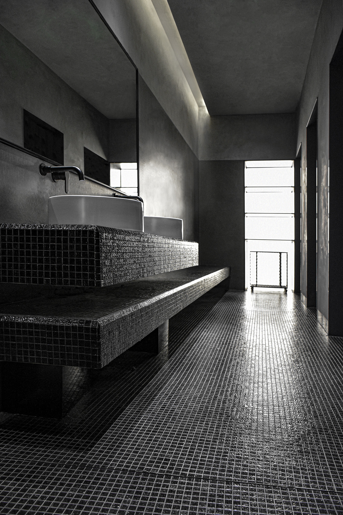 MFIT SPACE gym bathroom and shower rooms with their dark mysterious atmosphere have Bisazza mosaic tiles on floor design by RAMOPRIMO