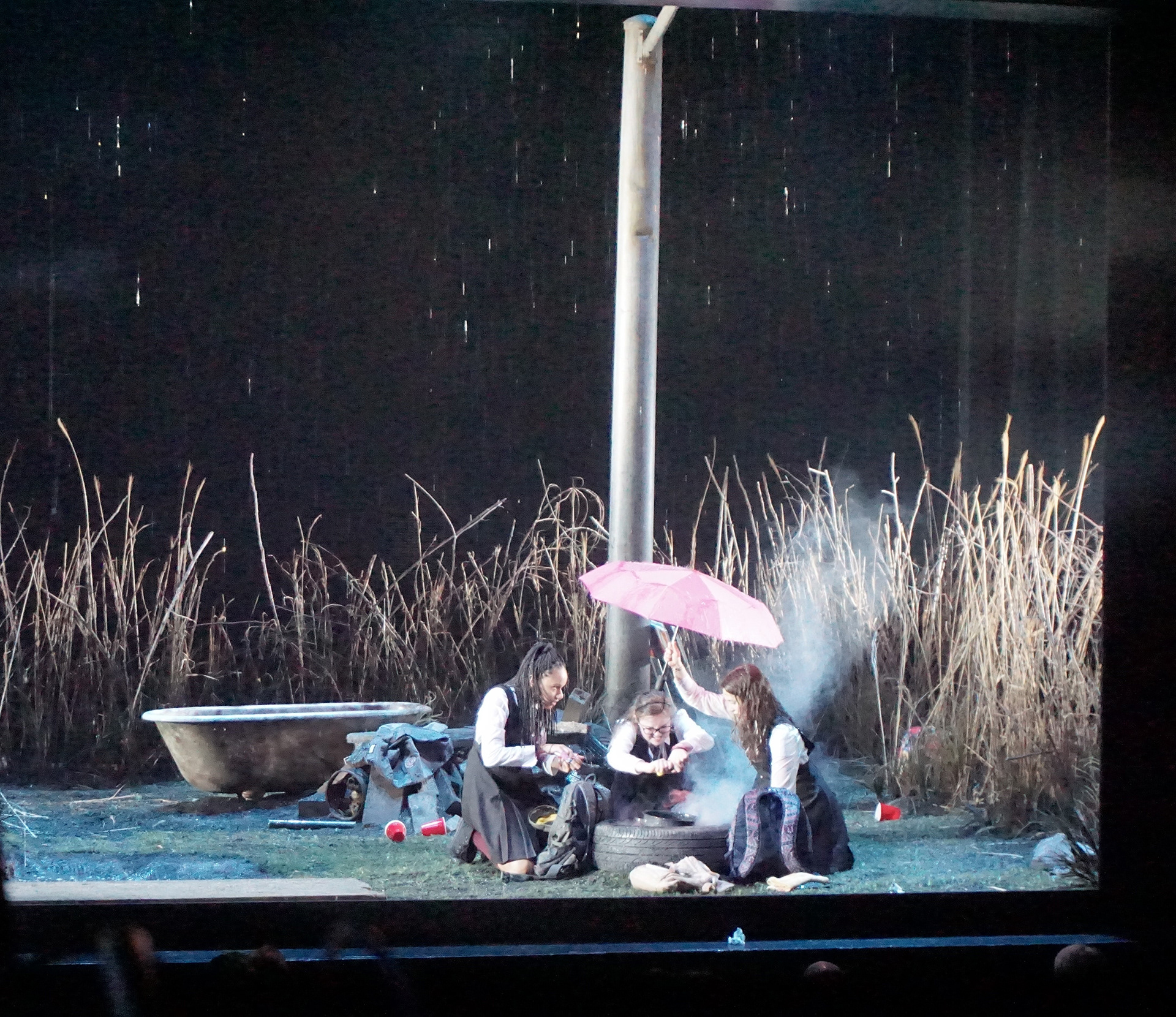 Full stage rain and tire fire (Seattle Rep)
