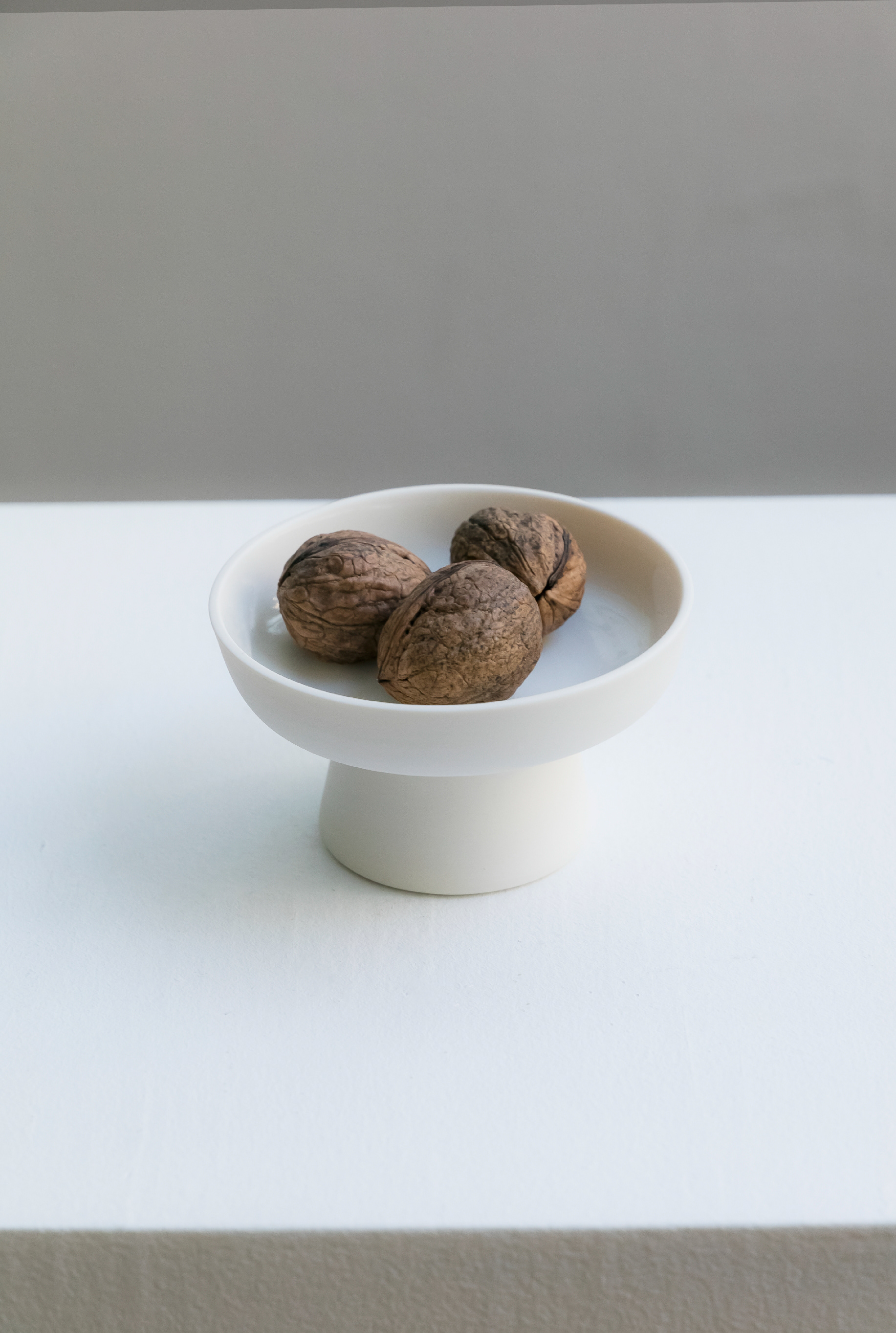 Coupe mini avec pied en porcelaine - 25€