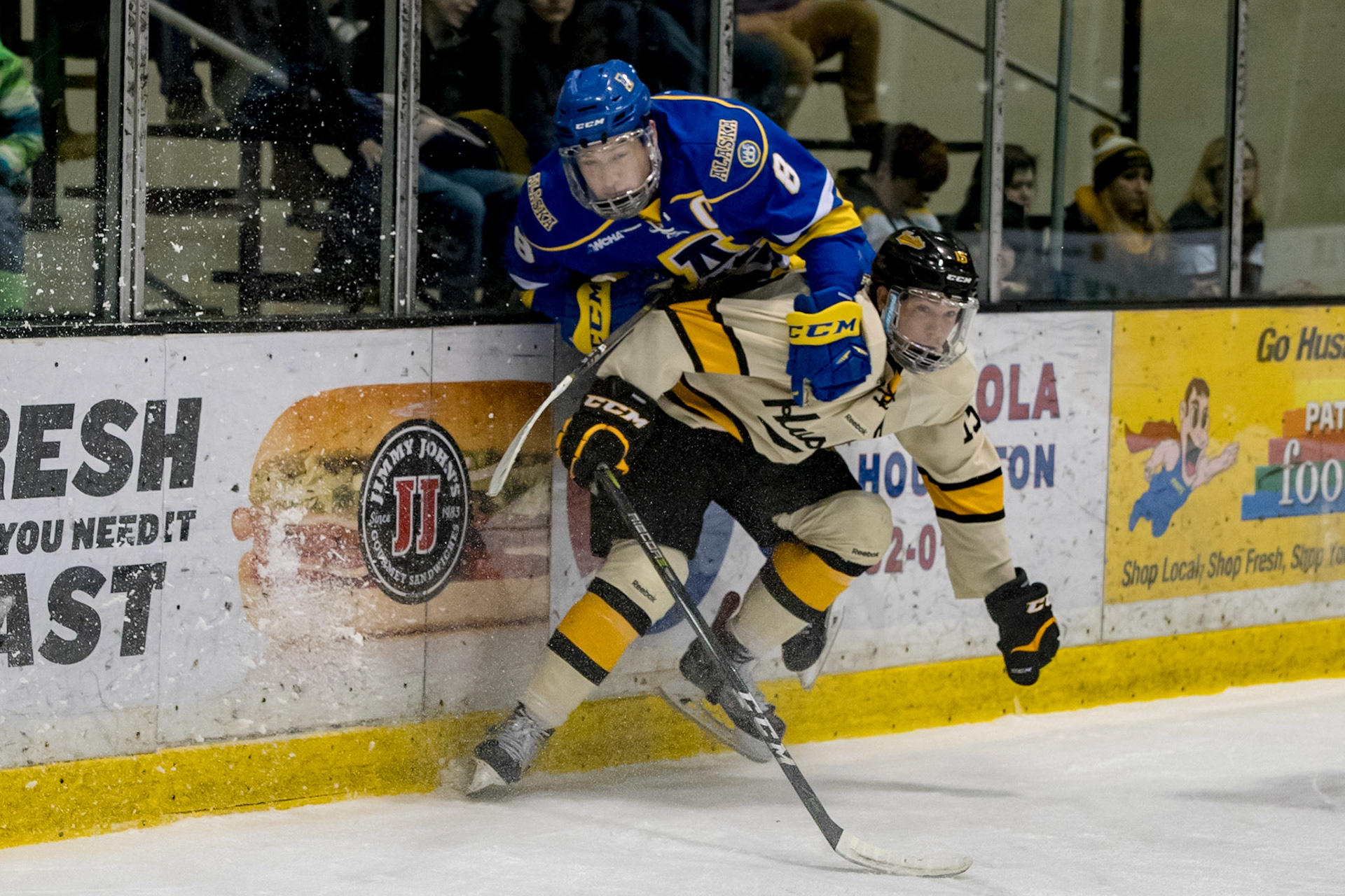 Alaska defender gets airborne during Friday night's game at the John MacInnes Student Ice Arena in Houghton Michigan.