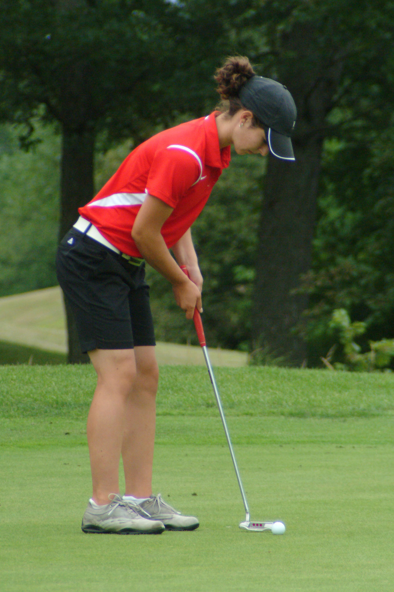 080709tvmGLFLCINVITE_1 Tony V. Martin CRETE-Munster's Kamryn Klawitter on the 9th green. Girls Invitational at Longwood Country Club on Friday.