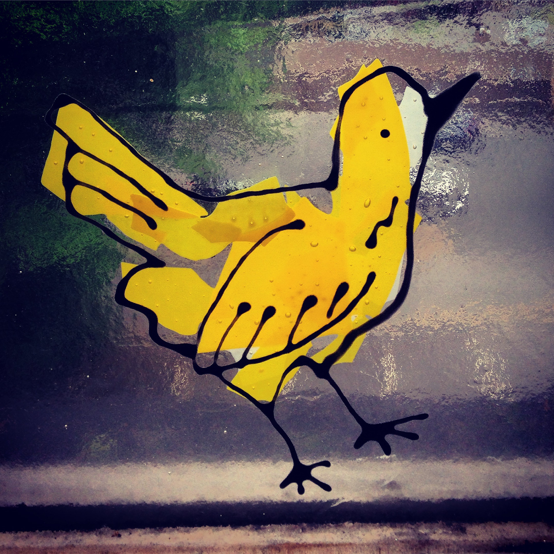 Fused and stained glass birds tiles. Kiln fired. Made by Zoe Eady at the Glass Garden, Leeds. Yellow