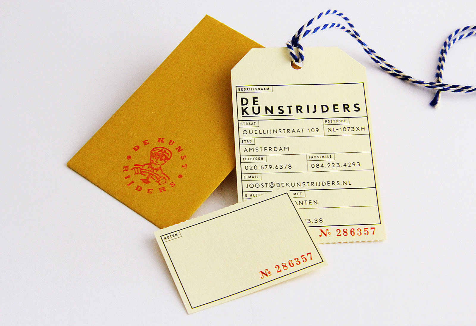 Business card and envelope that contains the card