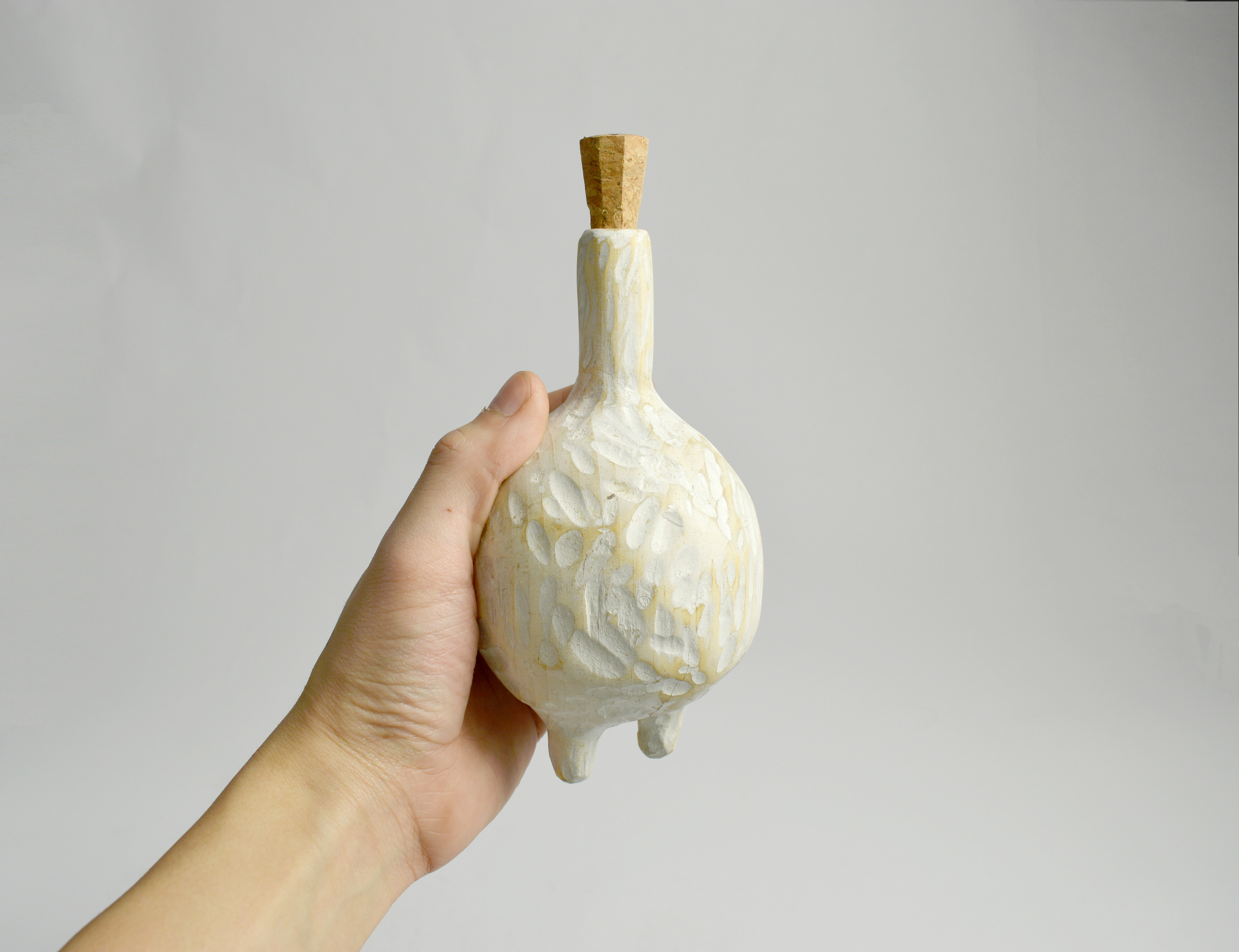Hand carved bottle vessel