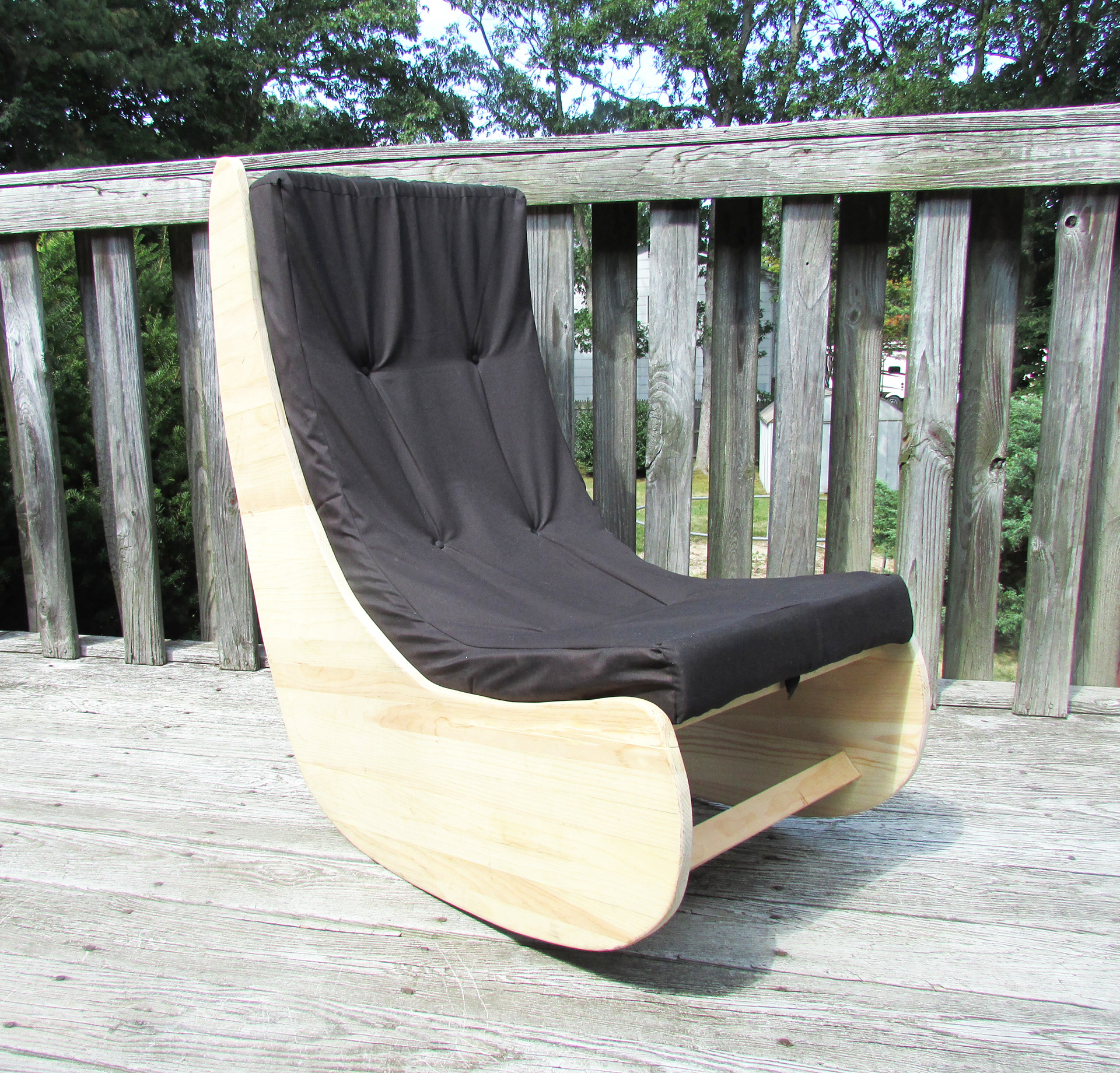 Cushion attaches to seat with tie strips