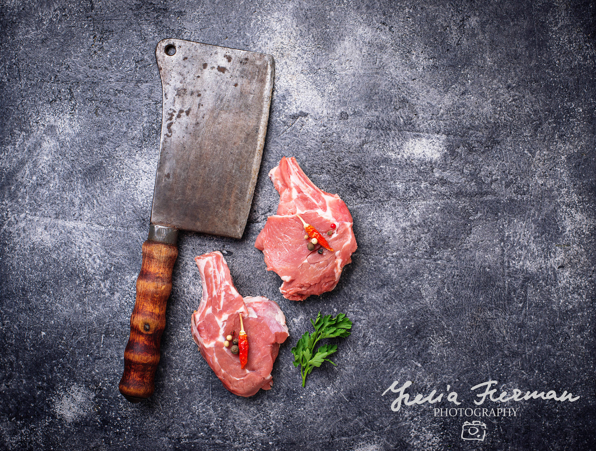 Raw meat and butchers knife. Top view