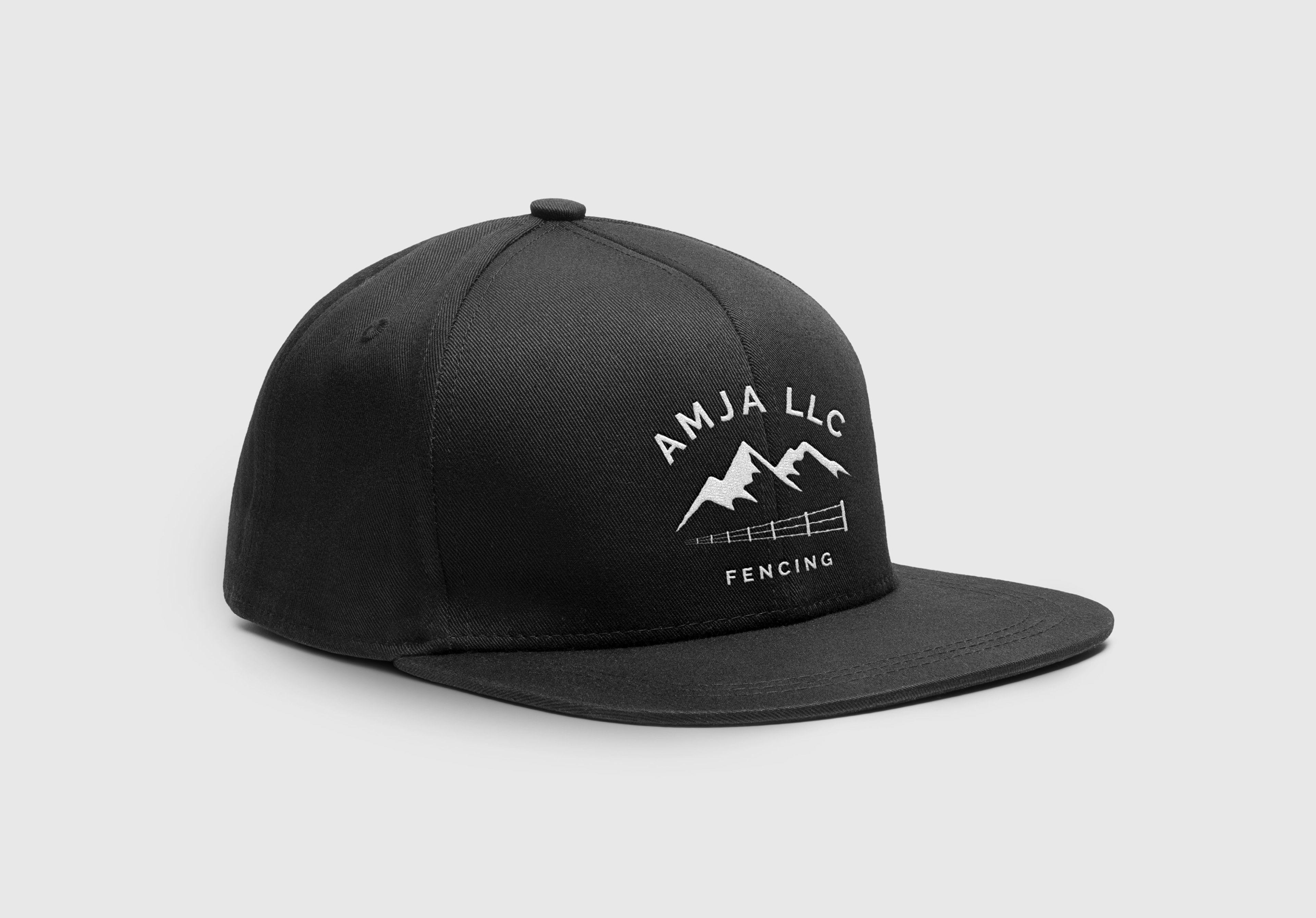 Embroidered hat mockup featuring AMJA LLC Fencing's new, rustic, and minimal logo design for business in Grangeville, Idaho