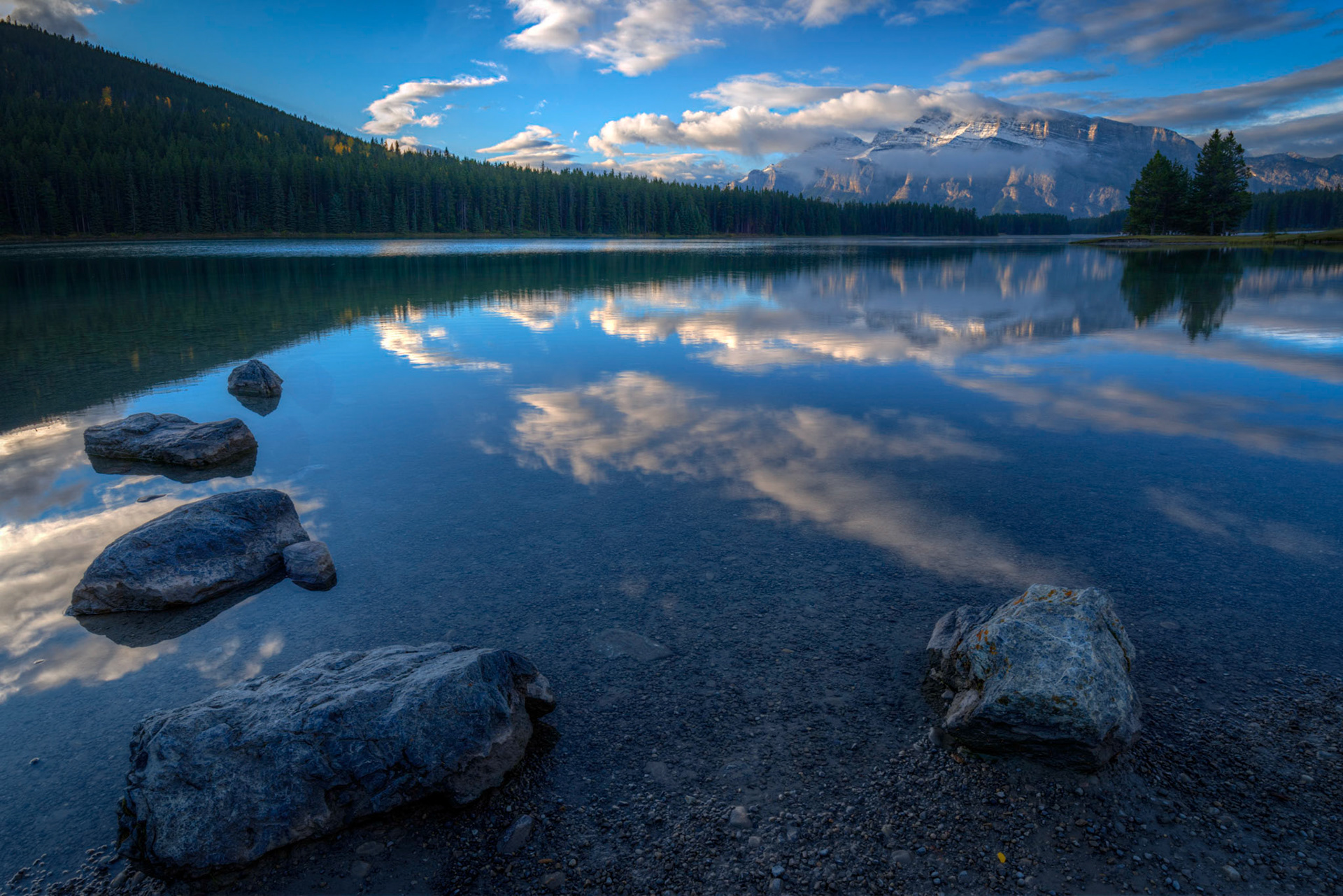 Early morning clouds lingering over Mount Rundle, from the shore of Two Jack Lake.Banff National ParkAlberta, CanadaSeptember 23, 2016This is an HDR image consisting of 5 exposures merged in Photomatix Pro. Additional processing in Lightroom and Photoshop.PENTAX K-1, HD PENTAX-D FA 15-30mm F2.8ED SDM WRISO 100 18 mm  ¹⁄₁₀ sec at ƒ / 20