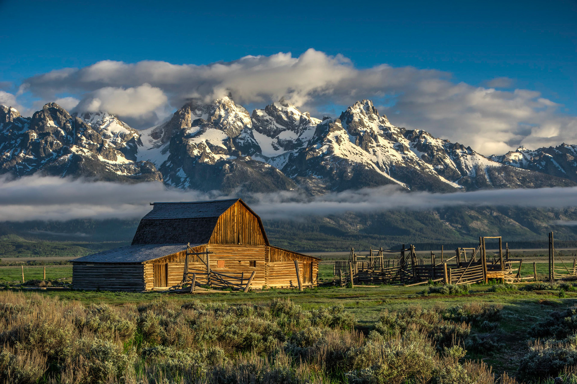 Shortly after a frosty sunrise at the John Moulton barn on Mormon Row.  Grand Teton National Park.Grand Teton National Park15 June 2014PENTAX K-3, Sigma 18-250mm f/3.5-6.3 DC OS HSMISO 100 45 mm  ¹⁄₃₀ sec at ƒ / 14Prints of my work are available from my website at http://www.fingolfinphoto.comFollow me on Facebook at http://www.facebook.com/fingolfinphoto or http://www.facebook.com/pesterleAlso, http://500px.com/pesterle   http://www.flickr.com/photos/fingolfinphoto