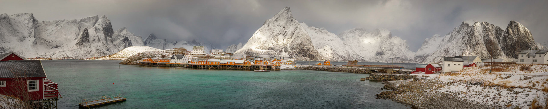 The fjord containing the town of Reine.Reine, Nordland, NorwayMarch 18, 2018This is a panoramic images consisting of 7 frames stitched in Lightroom. Additional processing in Lightroom and Photoshop.PENTAX K-1, HD PENTAX-D FA 24-70mm F2.8ED SDM WRISO 400 43 mm  ¹⁄₃₂₀ sec at ƒ / 13