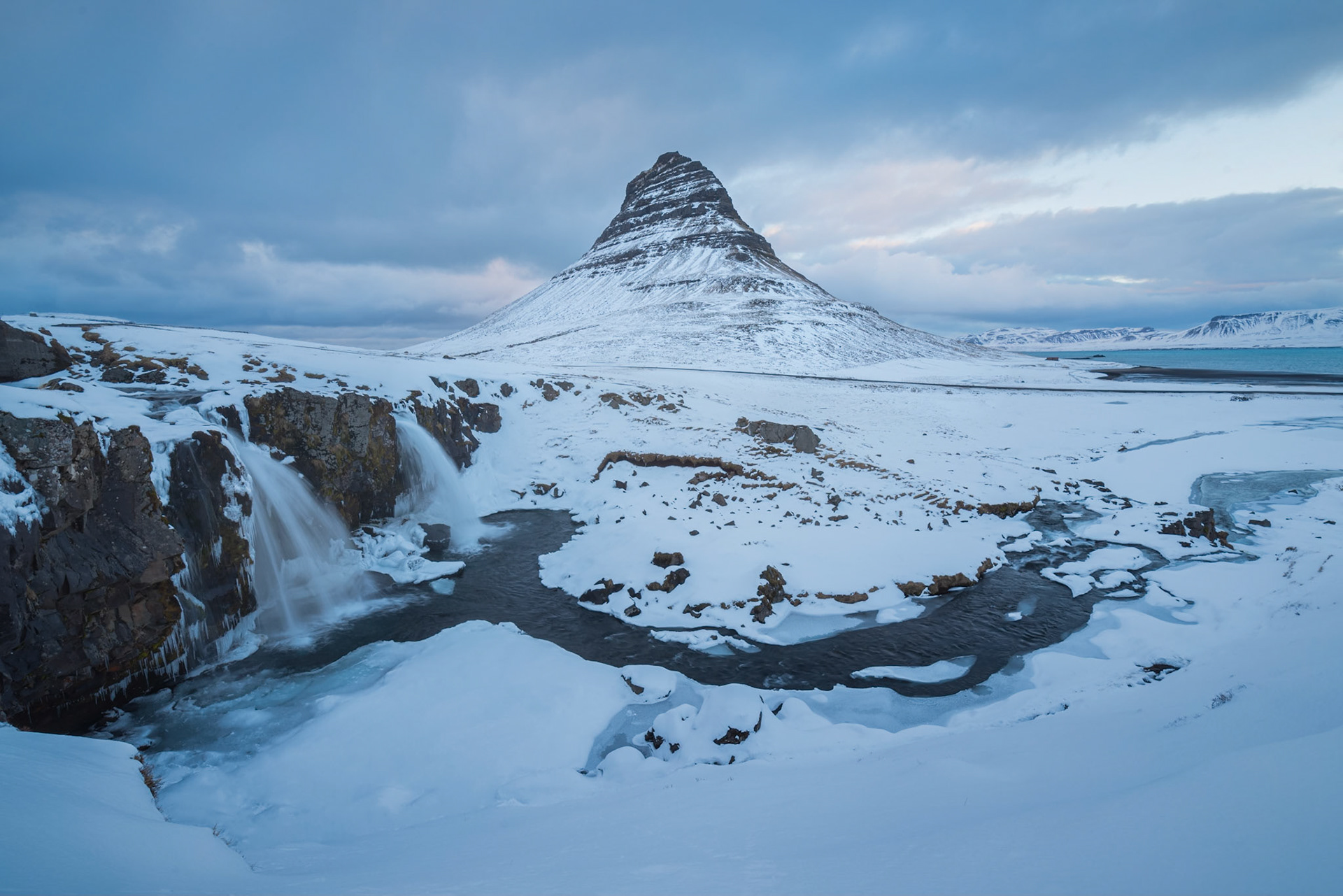 Kirkjufell and KirkjufellsfossVesturland, IcelandMarch 29, 2019Pentax K-1, HD PENTAX-D FA 15-30mm F2.8ED SDM WRISO 100 15 mm  ⅙ sec at ƒ / 18