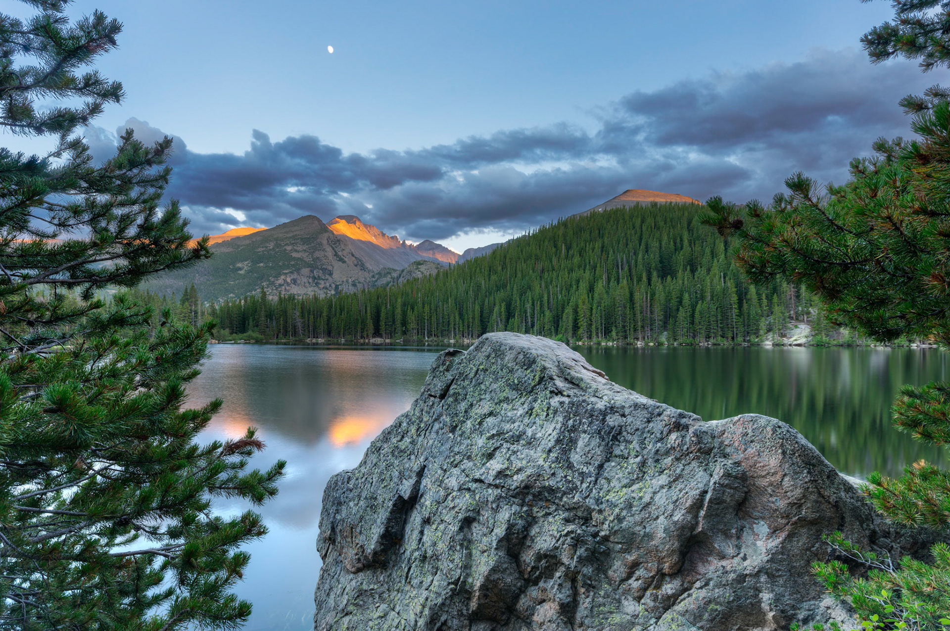 Fading sunlight on Longs Peak from the north shore of Bear Lake.Rocky Mountain National Park6 August 2014PENTAX K-3, Sigma 10-20mm f/4-5.6 EX DCISO 100 14 mm  0.6 sec at ƒ / 11Prints of my work are available from my website at http://www.fingolfinphoto.comFollow me on Facebook at http://www.facebook.com/fingolfinphoto or http://www.facebook.com/pesterleAlso, http://500px.com/pesterle   http://www.flickr.com/photos/fingolfinphoto