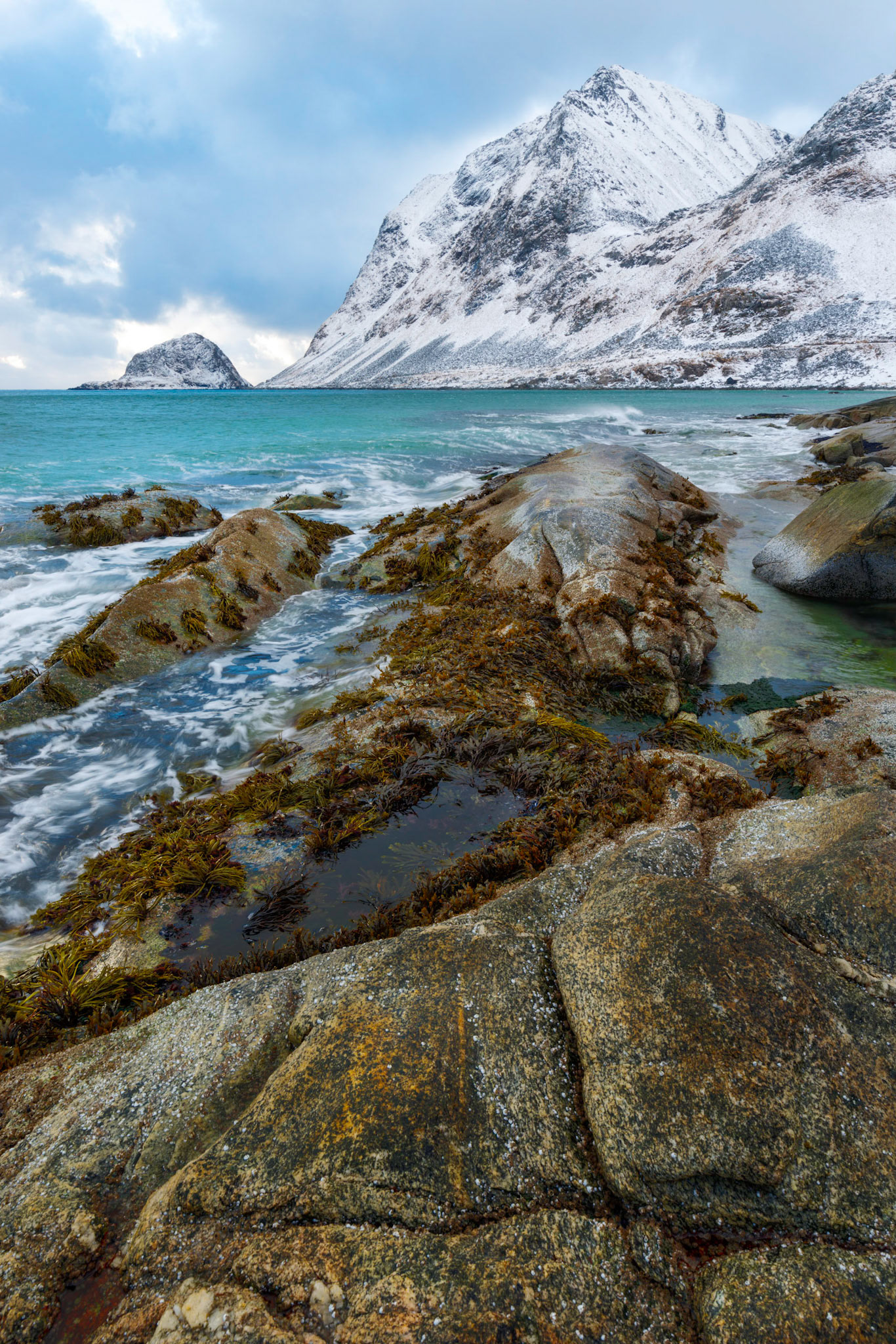 Along the shoreline of Haukland Beach at low tide.Leknes, Nordland, NorwayMarch 19, 2018PENTAX K-1, HD PENTAX-D FA 15-30mm F2.8ED SDM WRISO 100 22 mm  ⅛ sec at ƒ / 20